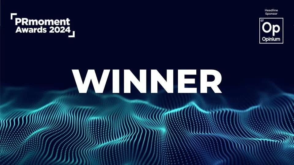 PRmoment Awards 2024 winner announcement with Opinium logo, abstract wave pattern background.