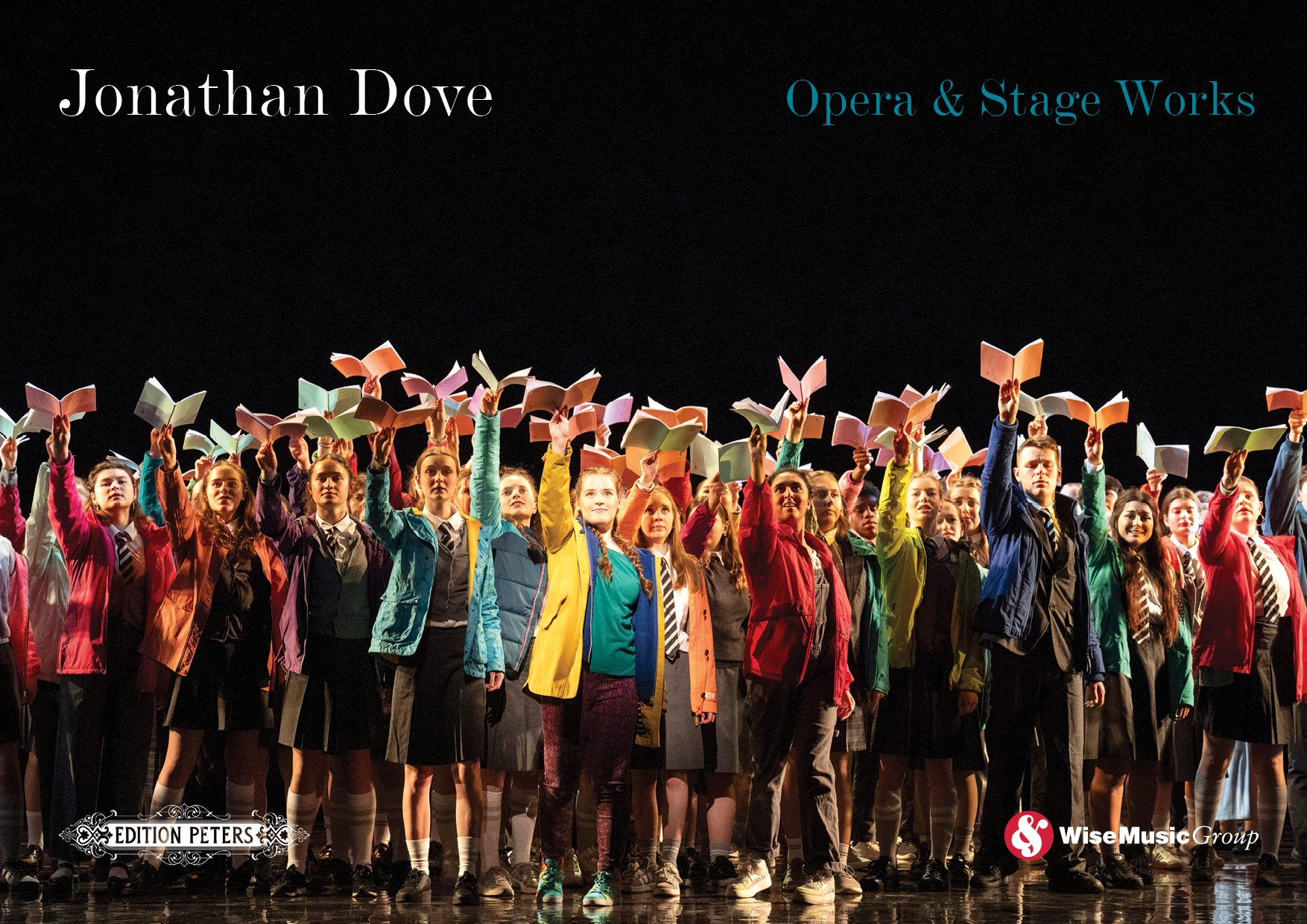 Cover for 'Jonathan Dove Opera & Stage Works' featuring a large group of children on stage wearing colorful jackets, holding open books with one arm raised, during a theatrical performance.