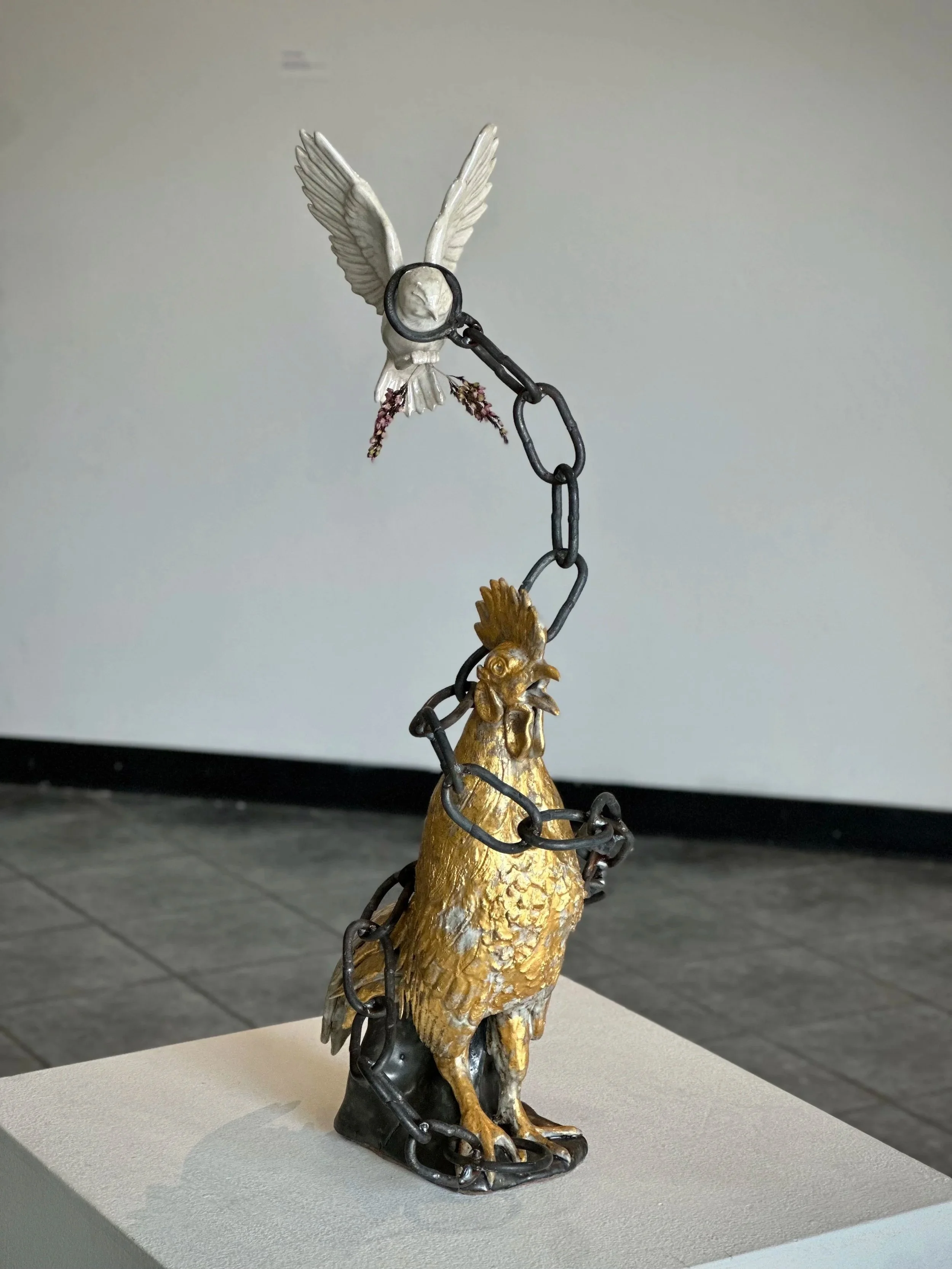 A Songbird and the Cock
2025 
25" x 9" x 12"
ceramic, glaze, hand-forged steel, 24k gold leaf, dried flowers