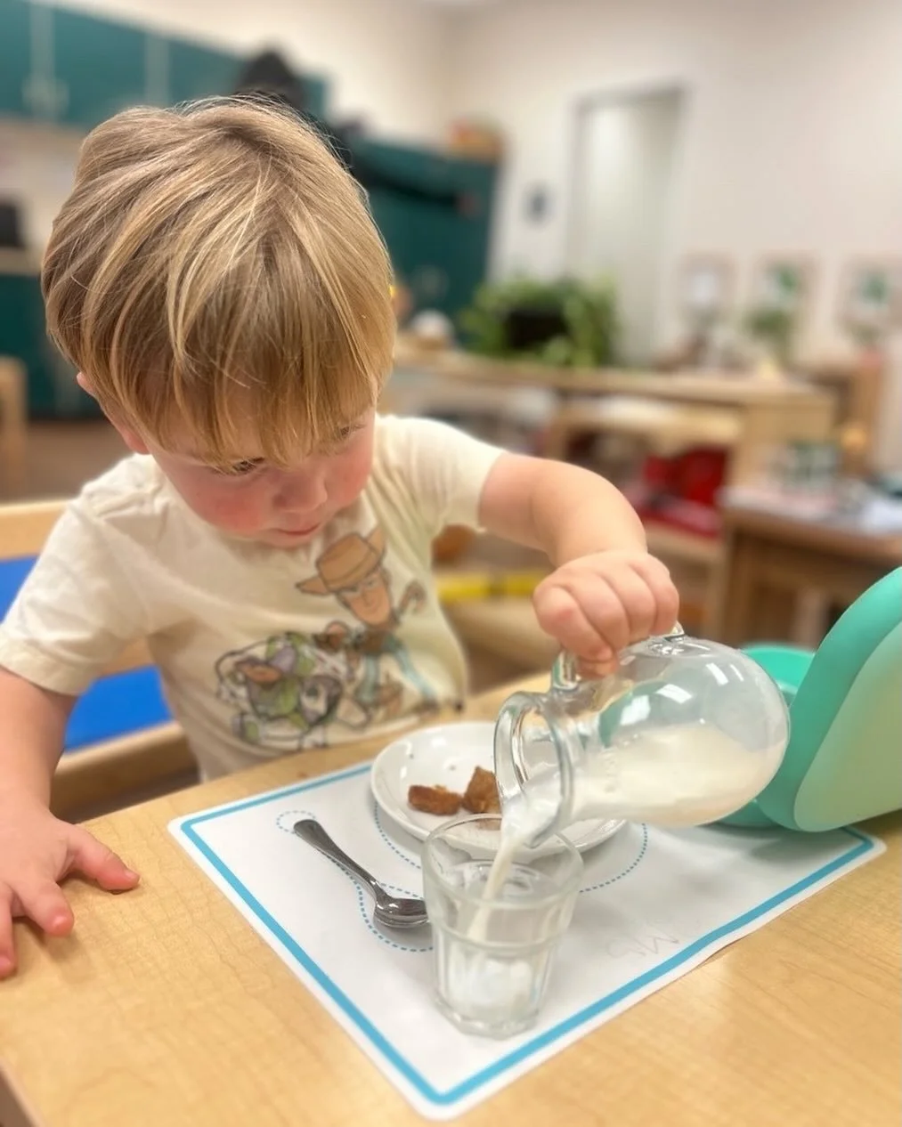 Slow, careful, and purposeful&mdash;our toddler pours his milk from pitcher to cup, building confidence and fine-motor skills along the way. 🥛✨ #montessori #huntersvillencmoms #huntersvillenc #montessorieducation #montessorichild #toddlerlife #woods