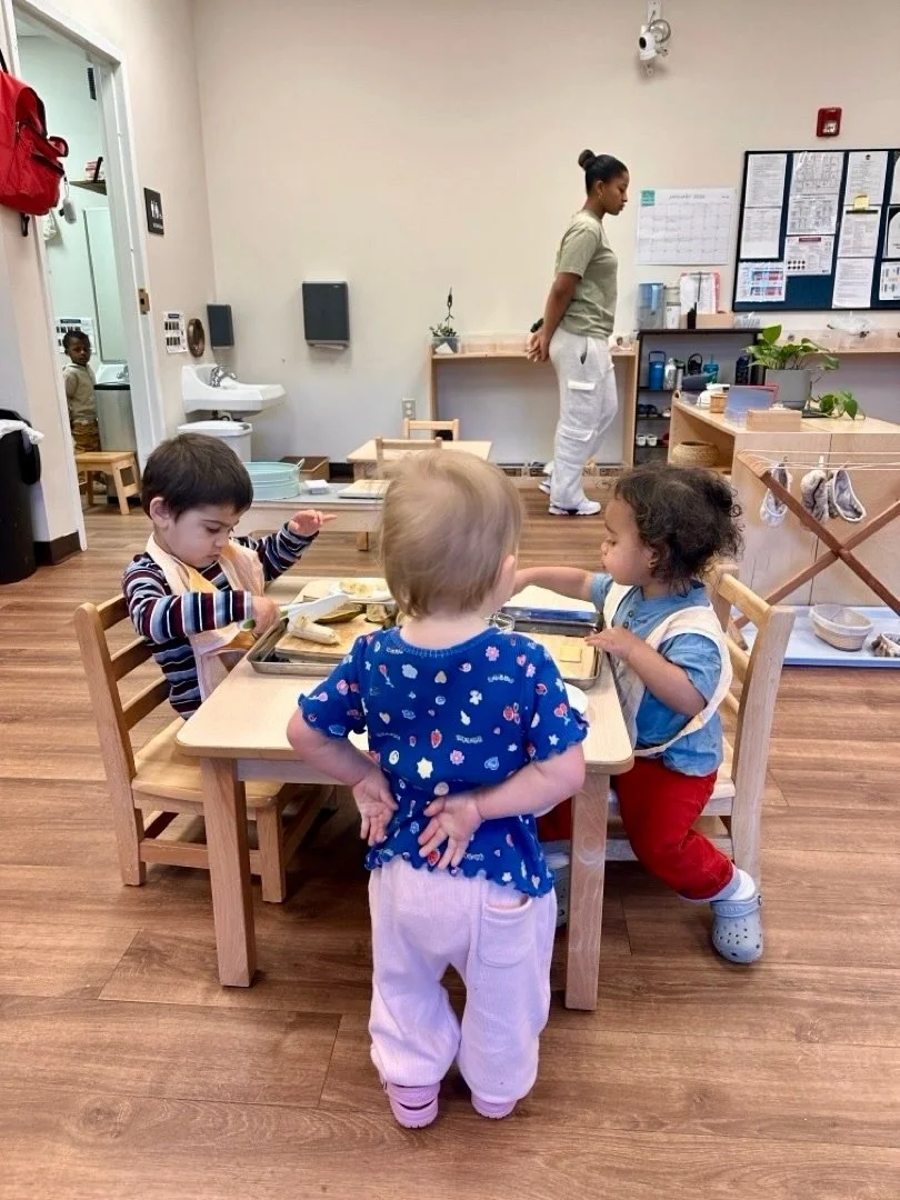 Little observers at work 🤍 
Hands behind their backs, eyes full of curiosity.

In a Montessori environment, children naturally model the behaviors they see. This simple gesture helps build self-discipline while practicing grace and courtesy, learnin