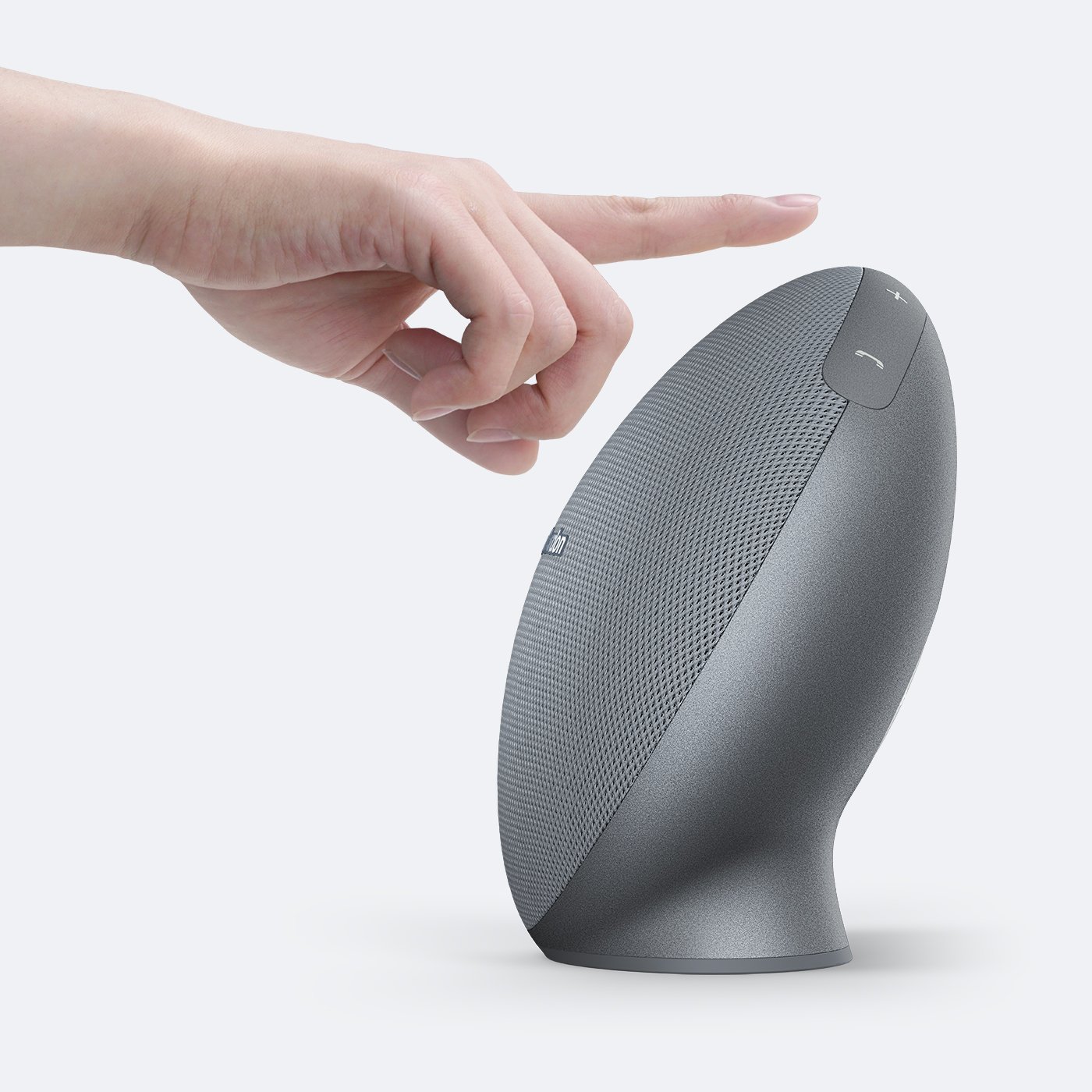 User pressing buttons on Harman Kardon Onyx Mini speaker