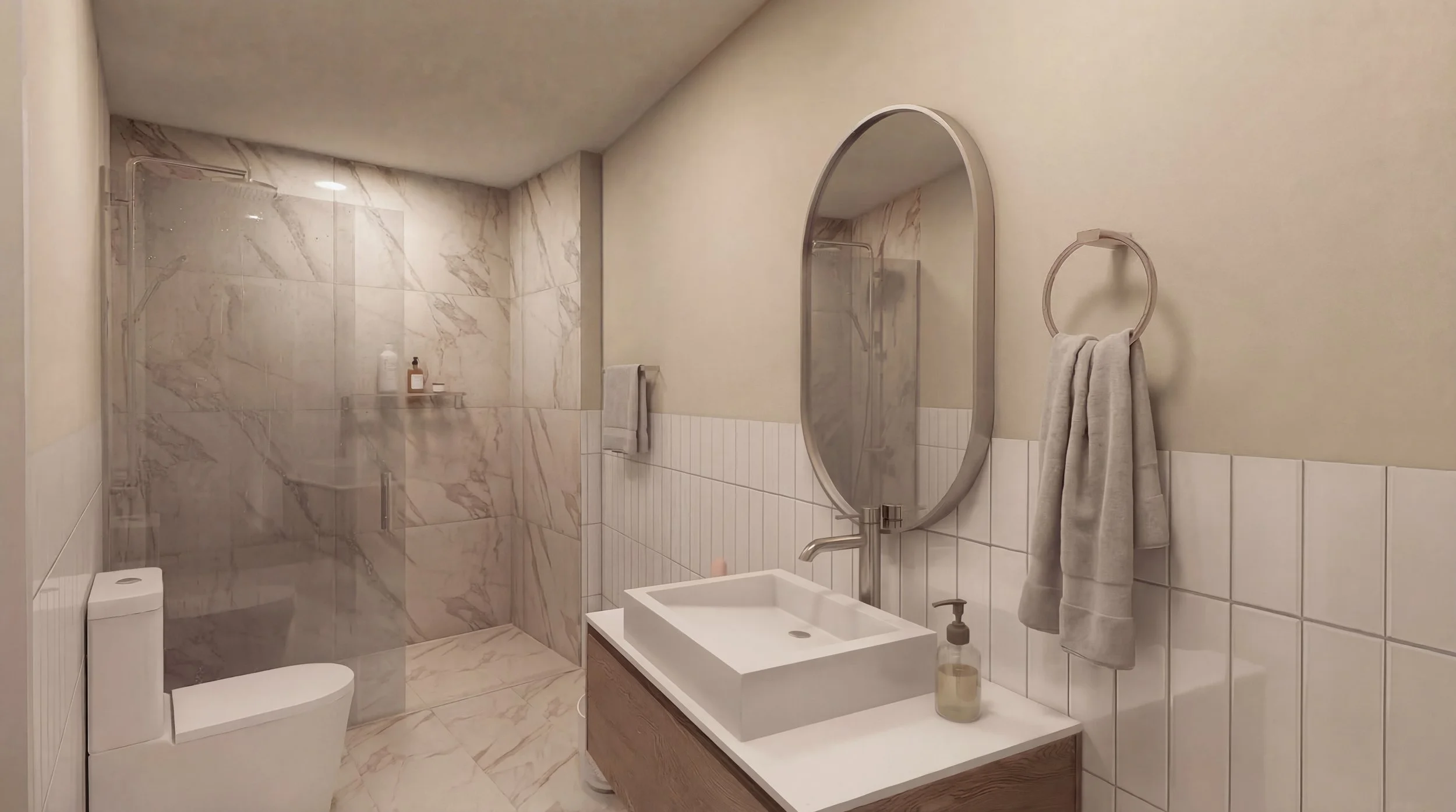 Modern bathroom featuring a walk-in shower with marble tiles, a toilet, a vanity with a rectangular sink, a large oval mirror, and wall-mounted towel rings with towels.