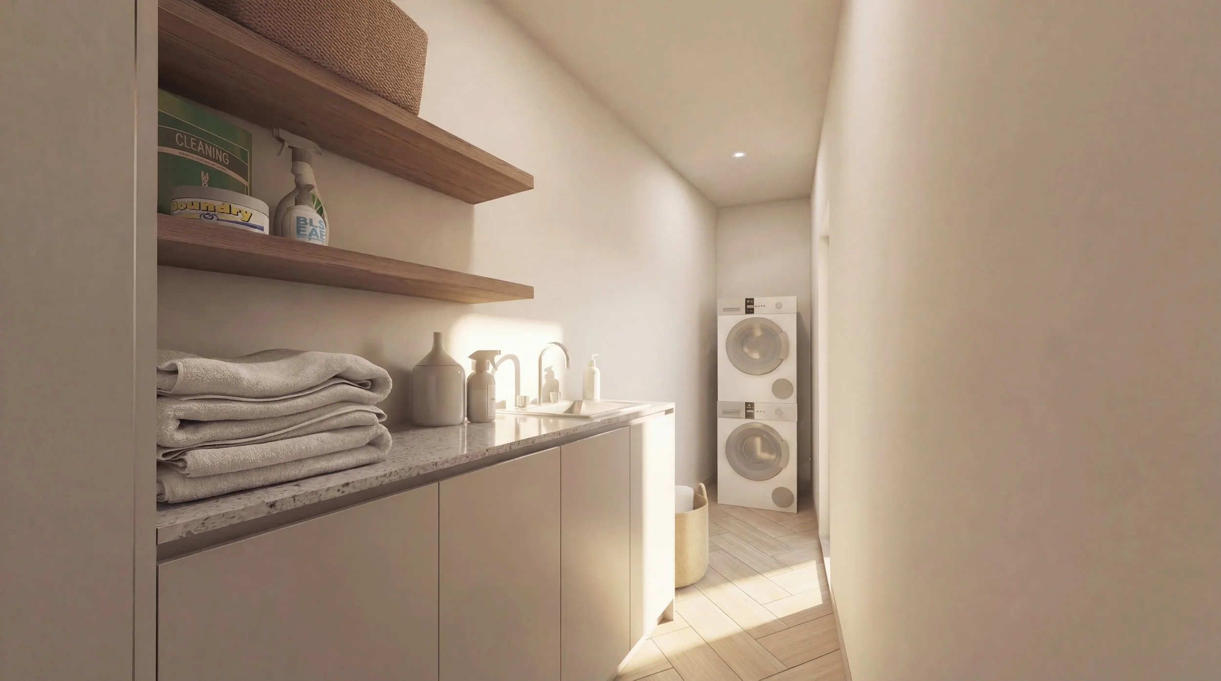 Utility room with a countertop, folded towels, laundry supplies, a sink, and stacked washer and dryer units.