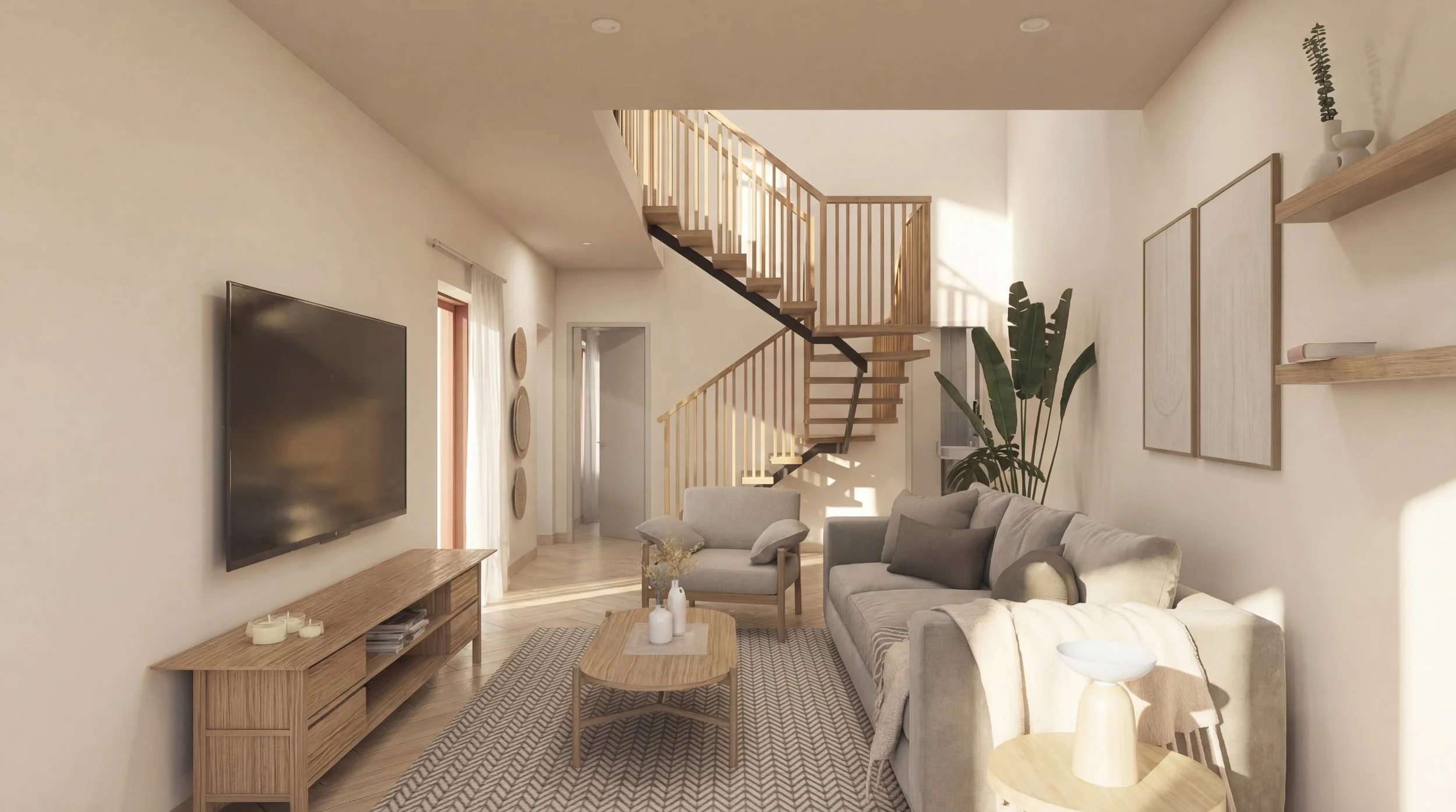 Living room with beige walls, a gray sofa, armchair, wooden coffee table, wall-mounted TV, wooden TV stand, patterned rug, bookshelves, and large plants, with a staircase leading upstairs