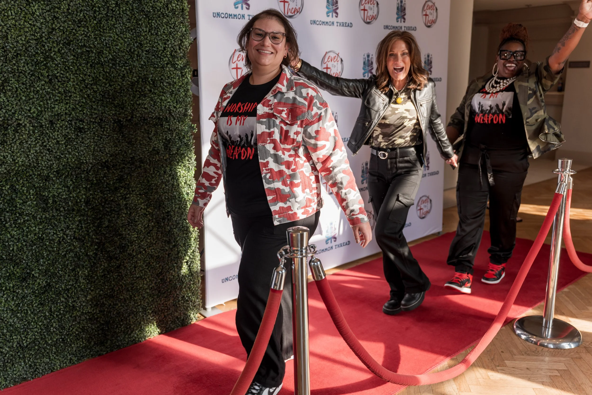 Melissa.Sandy.Lawanda step repeat.jpg