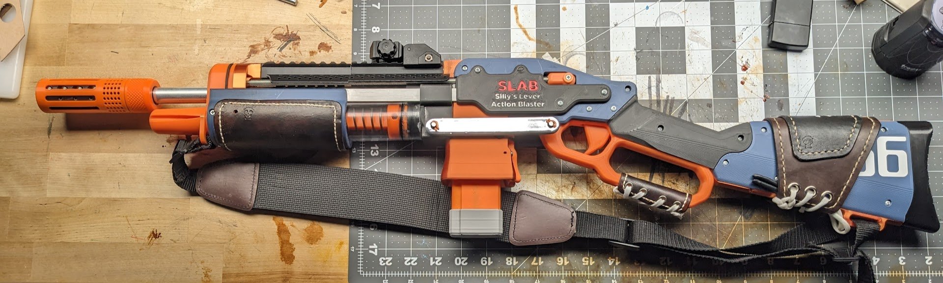 66 SLAB was my first Silly's Lever Action Blaster I ever built, and it is my personal SLAB. This was the blaster that got me into making custom leather pieces for Nerf.