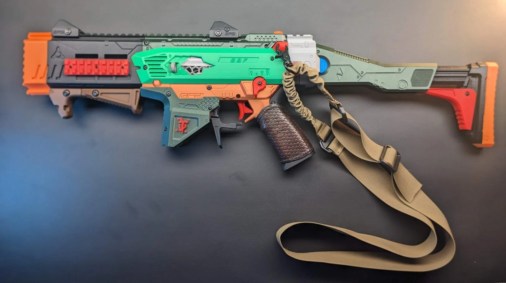 E1M1 is my completely customized DOOM themed SBF. He's got the slayer mark and a custom leather grip wrap. I also designed a "Meat Tenderizer" Muzzle for him and when he's turned on of course he plays E1M1 from the original DOOM