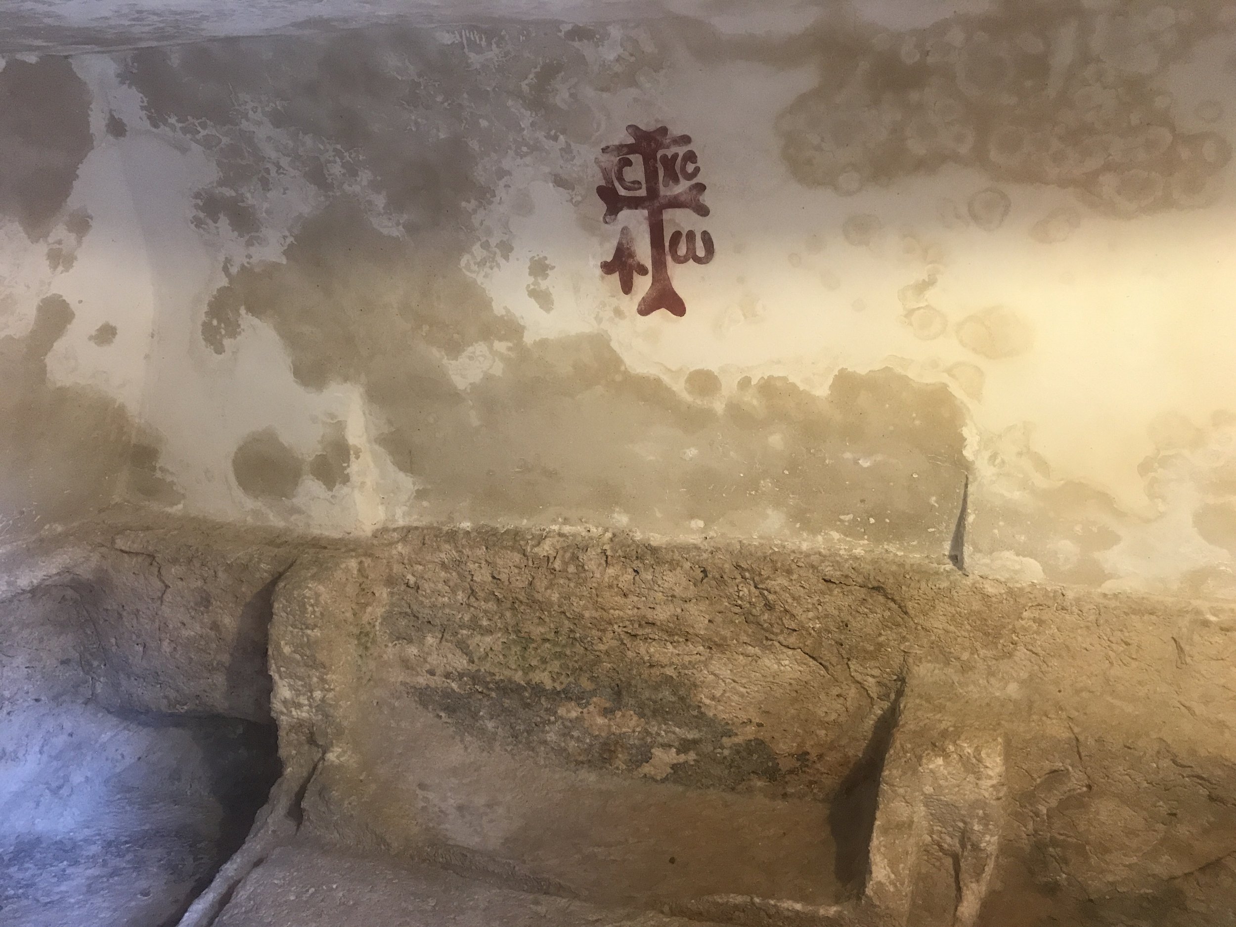 Empty tomb of Jesus in Israel symbolizing resurrection, new life, and God calling believers out of spiritual graves into freedom