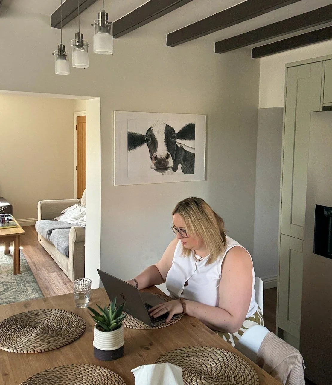 Abi typing at a laptop