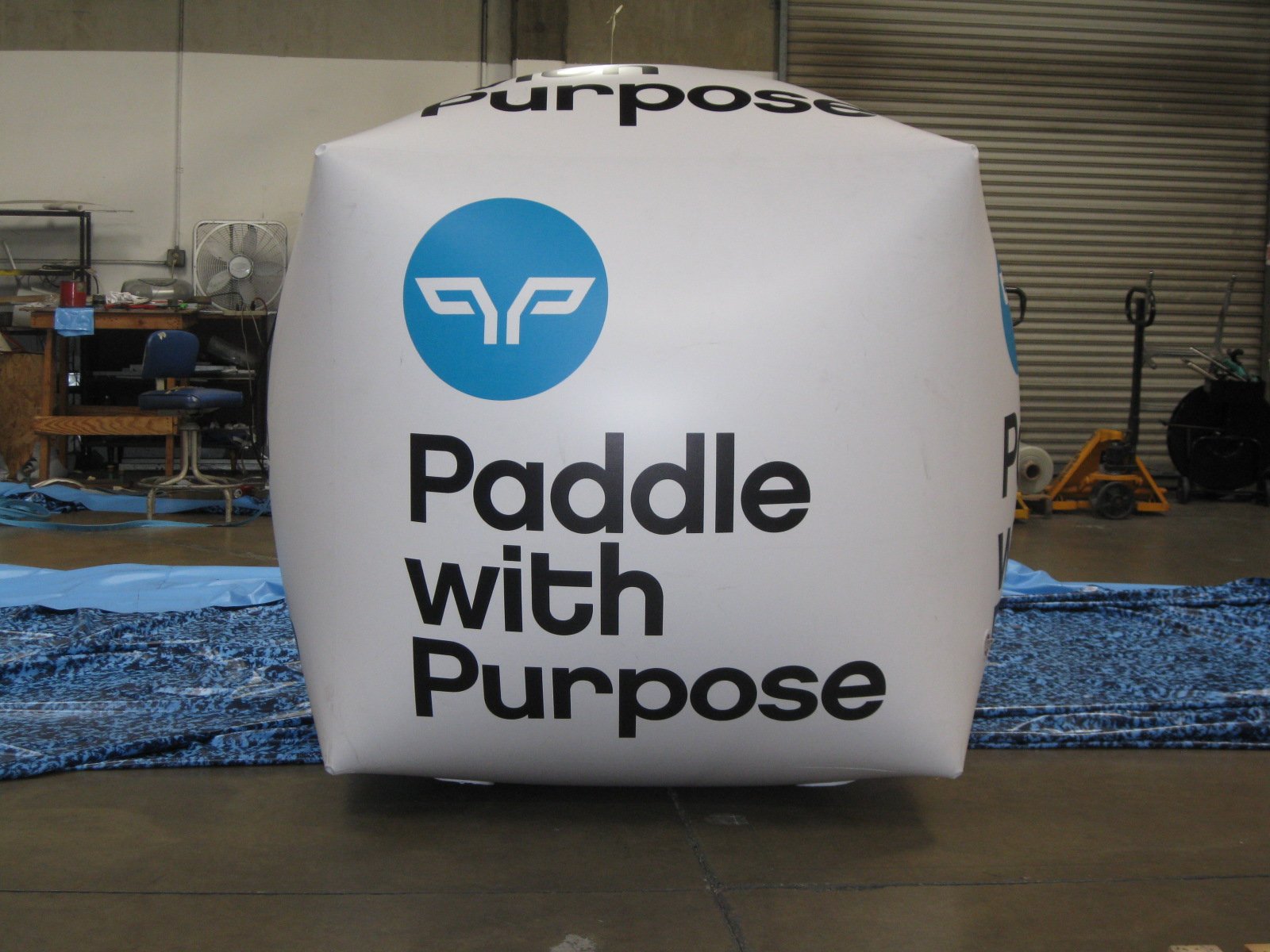 Paddle with a purpose inflatable advertisement.jpeg