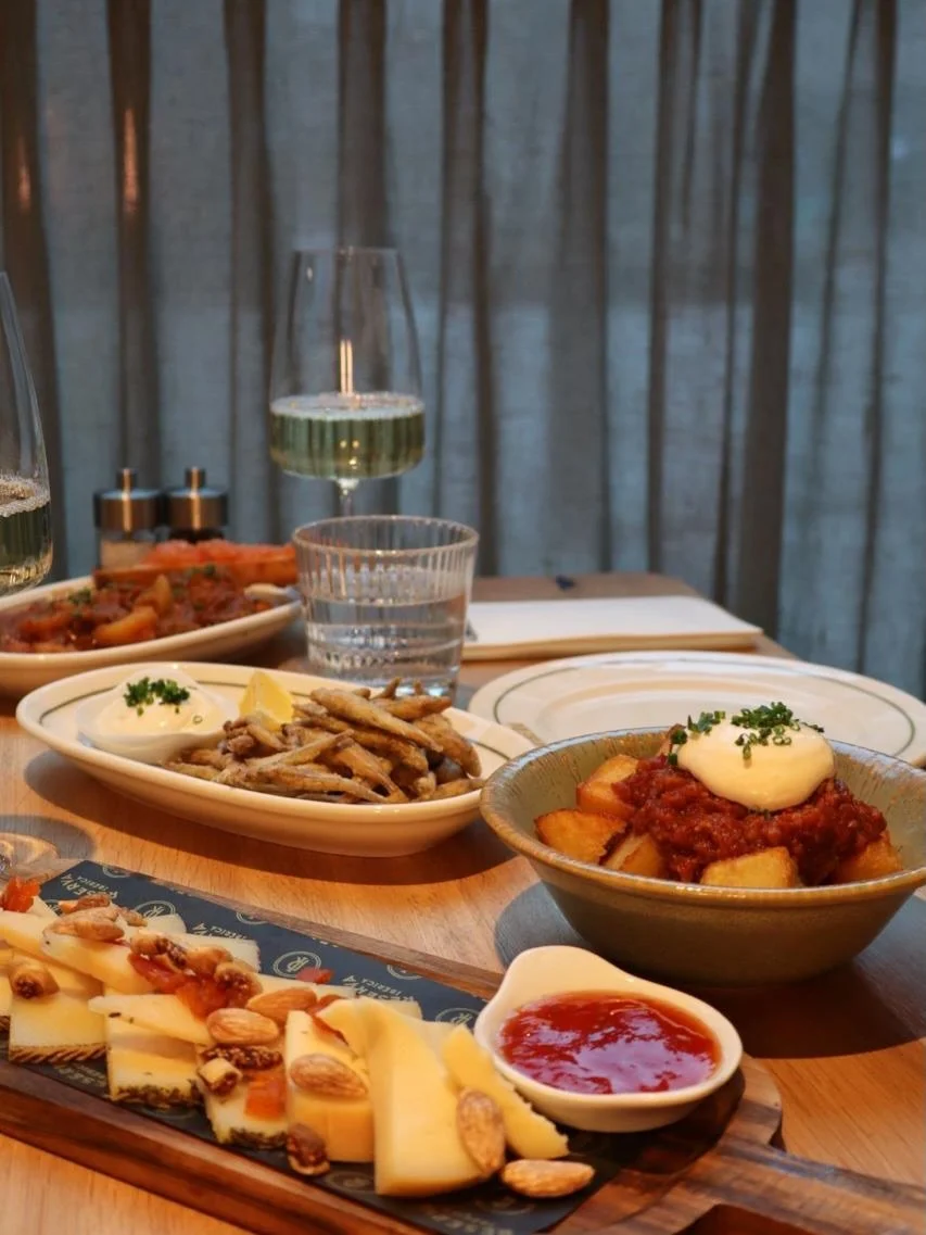 Cheese.
Pescaito frito.
Patatas bravas.

Say less. 🇪🇸🔥
Who are you bringing to share this with?

Book through the link in our bio.