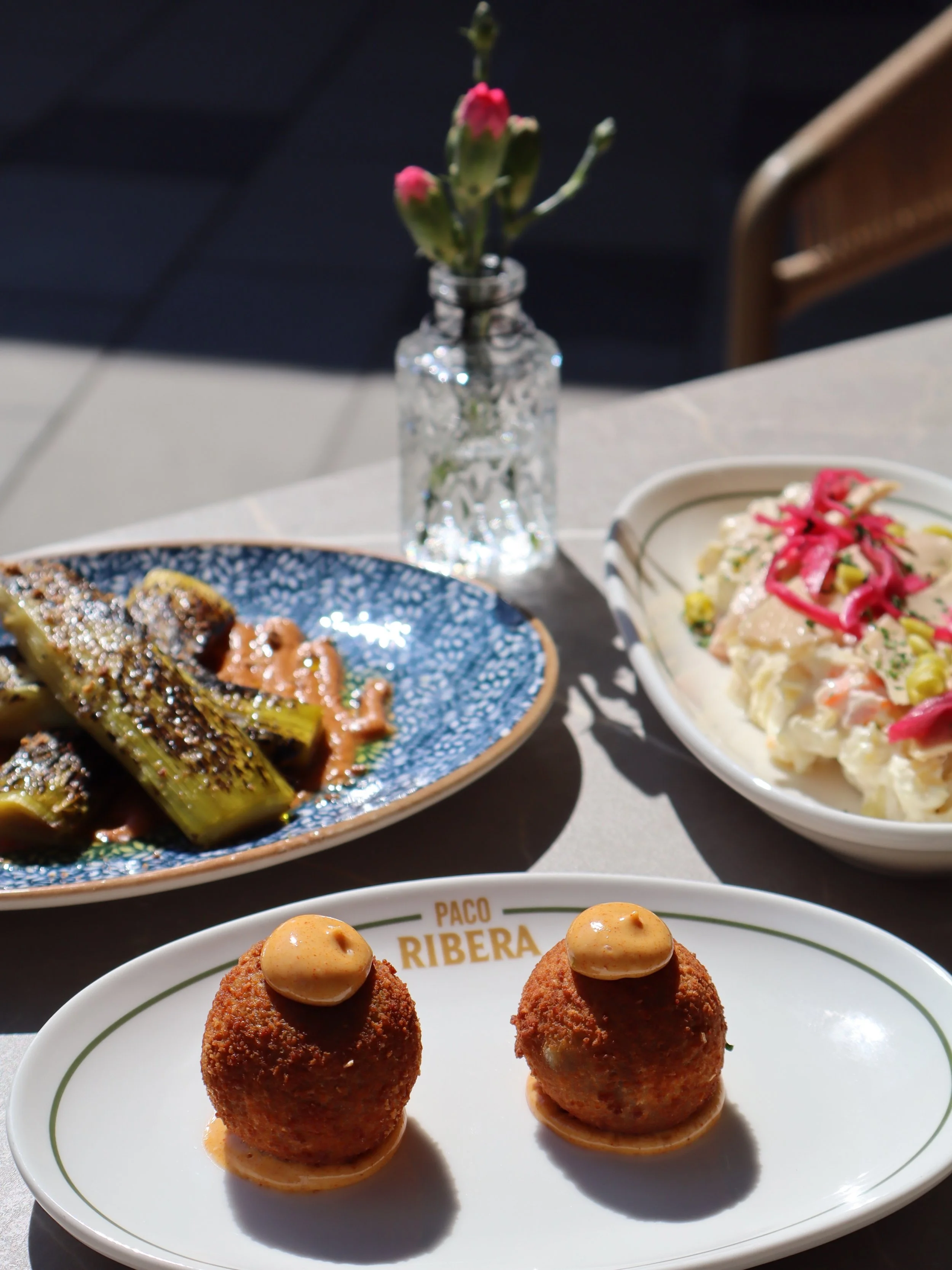 Croquetas de pulpo and the most delicious ensaladilla rusa in the confort of our beautiful outdoor space &hearts;️🌸

What are you waiting for to try?
