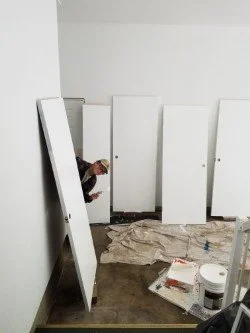 Install new interior doors or paint and up date existing doors and bi-folds