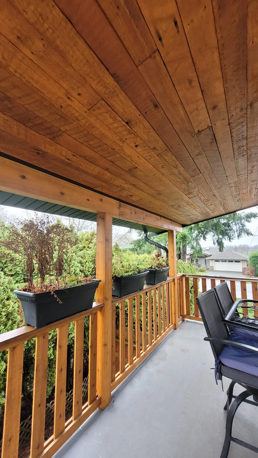 Custom wood deck rail and ceiling