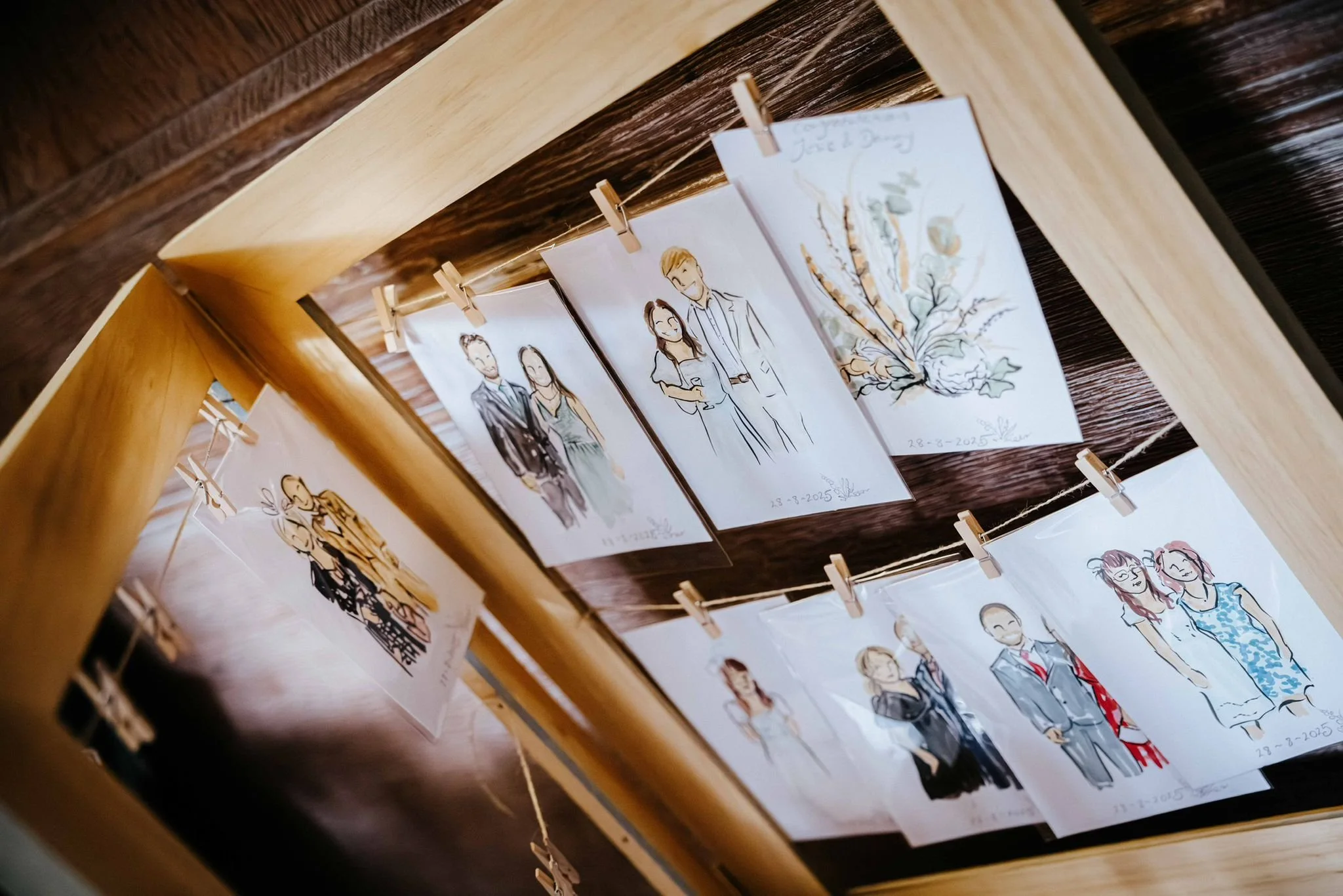 Portraits on display for wedding guests to collect