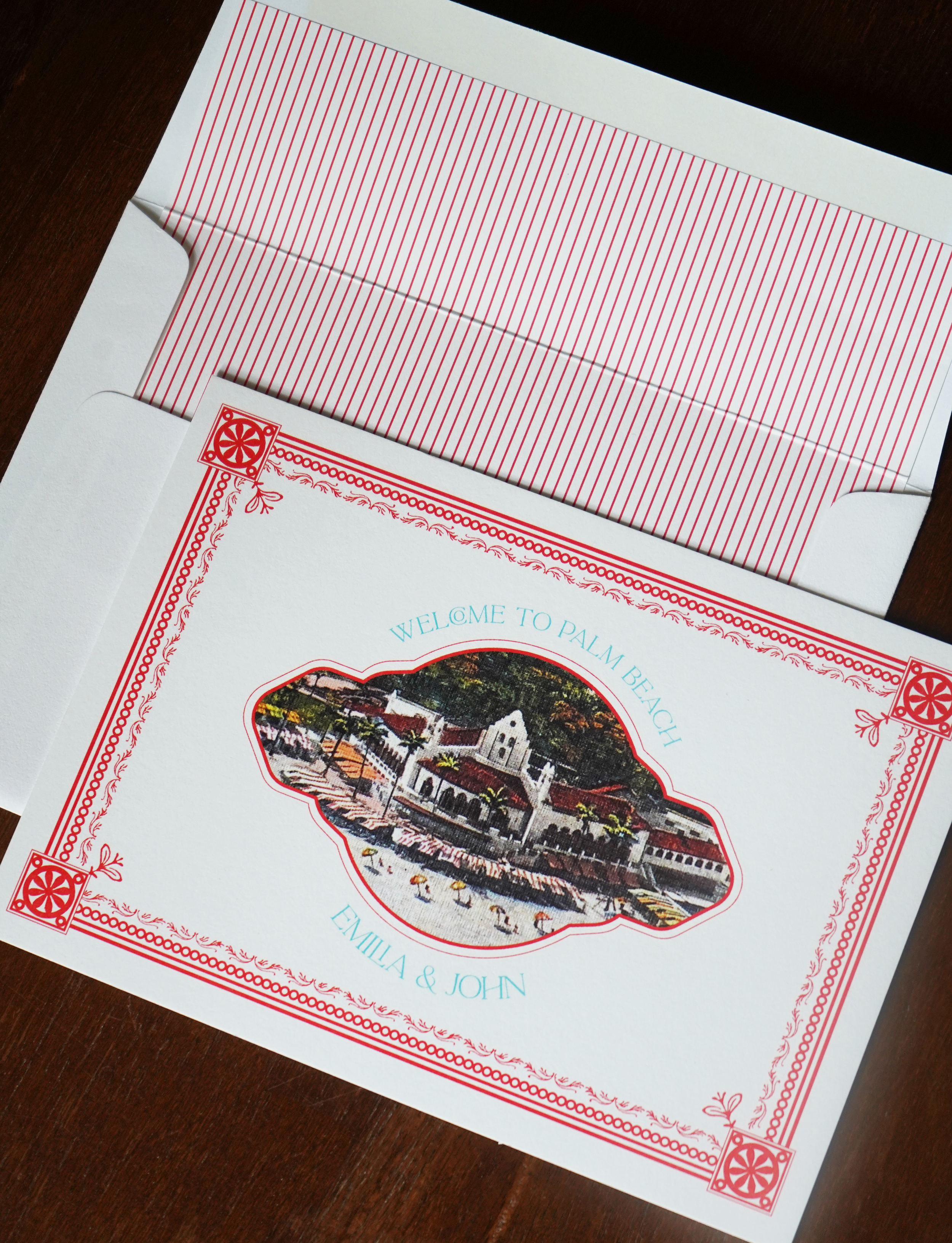 Custom luxury wedding welcome invitation featuring illustrated artwork and fine art stationery design with bespoke detailing