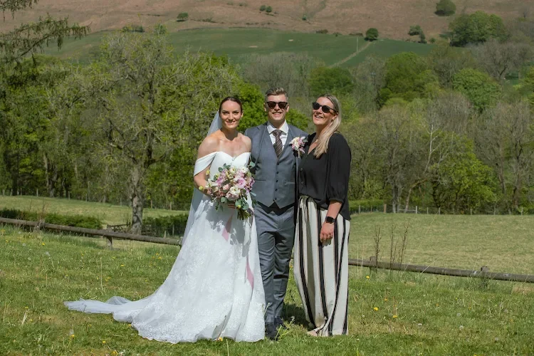 bride, groom and celebrant at a Derbyshire wedding