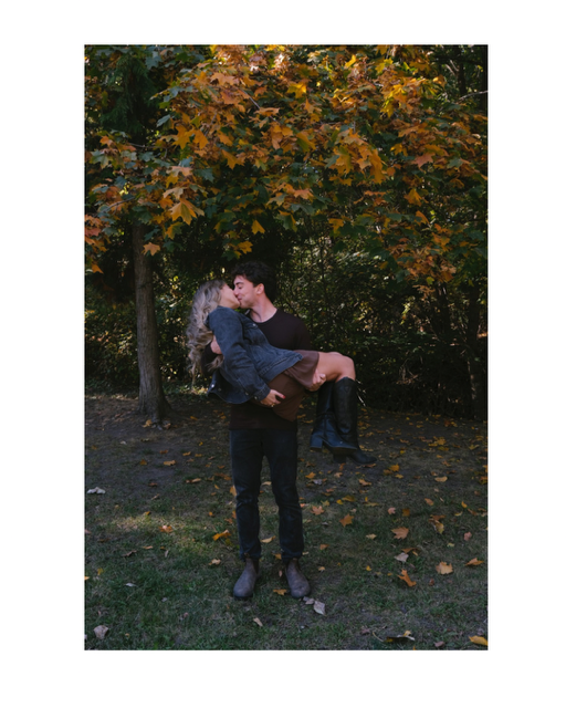 couple fall autumn photoshoot yellow leaves kissing