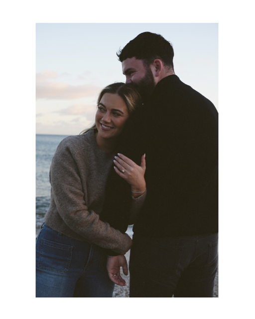 engagement couple on beach candid photoshoot diamond ring