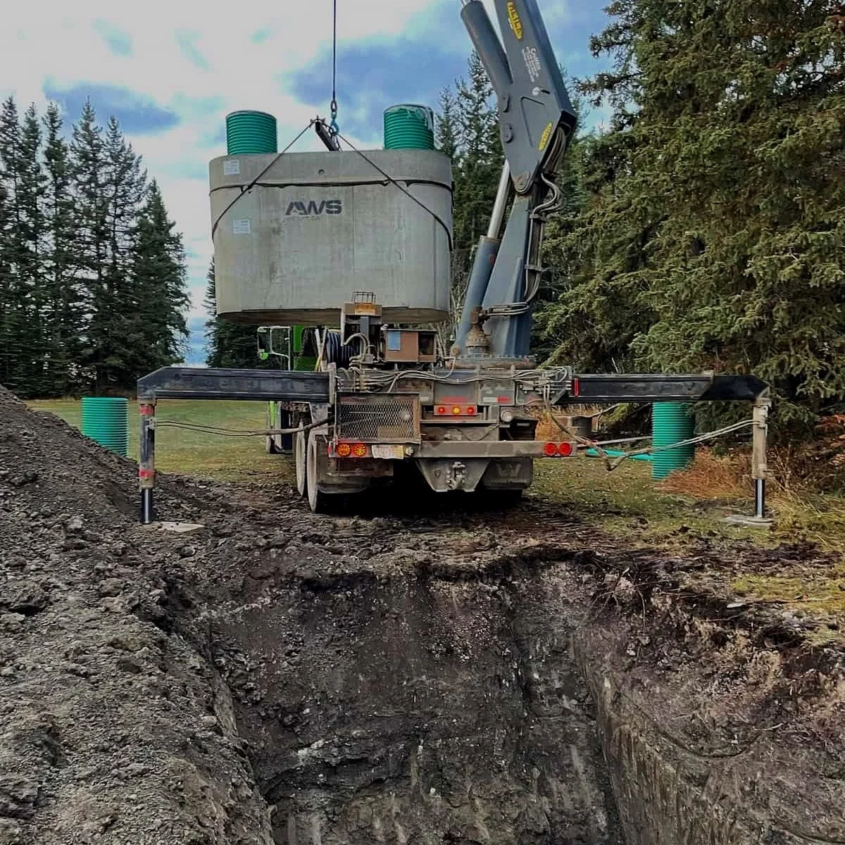 Tank shown: Alberta Wilbert Sales® (AWS®) precast concrete tank — installed by Rooted Earthwork & Wastewater.