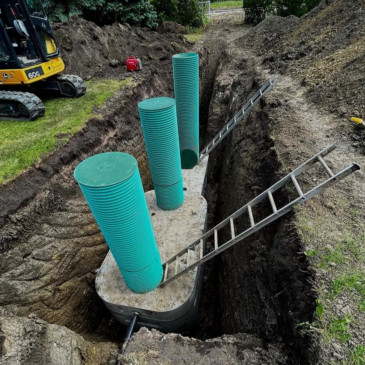 Tank shown: Alberta Wilbert Sales® (AWS®) precast concrete tank — installed by Rooted Earthwork & Wastewater.