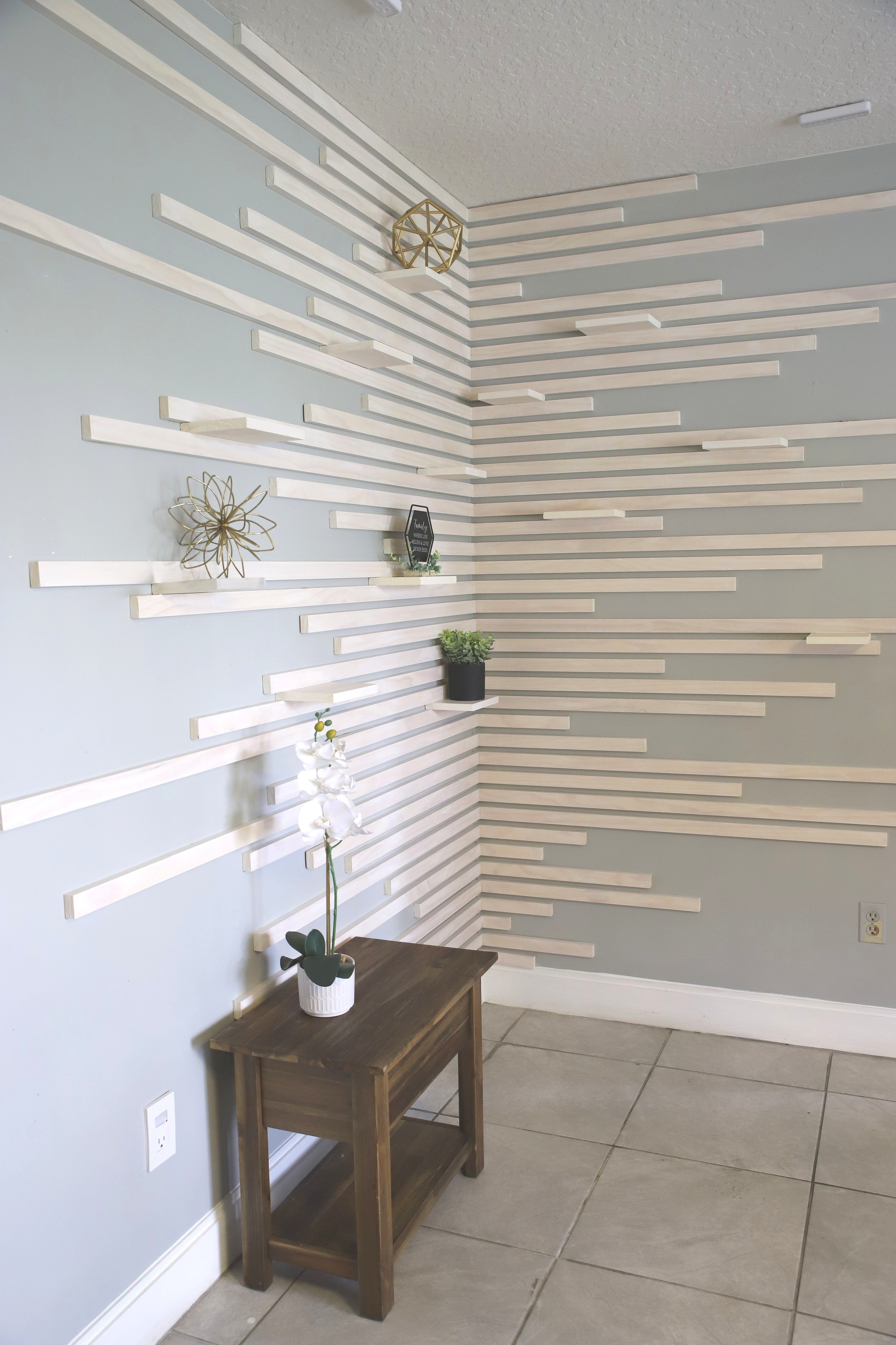 White wash pine wood molding wall with shelves