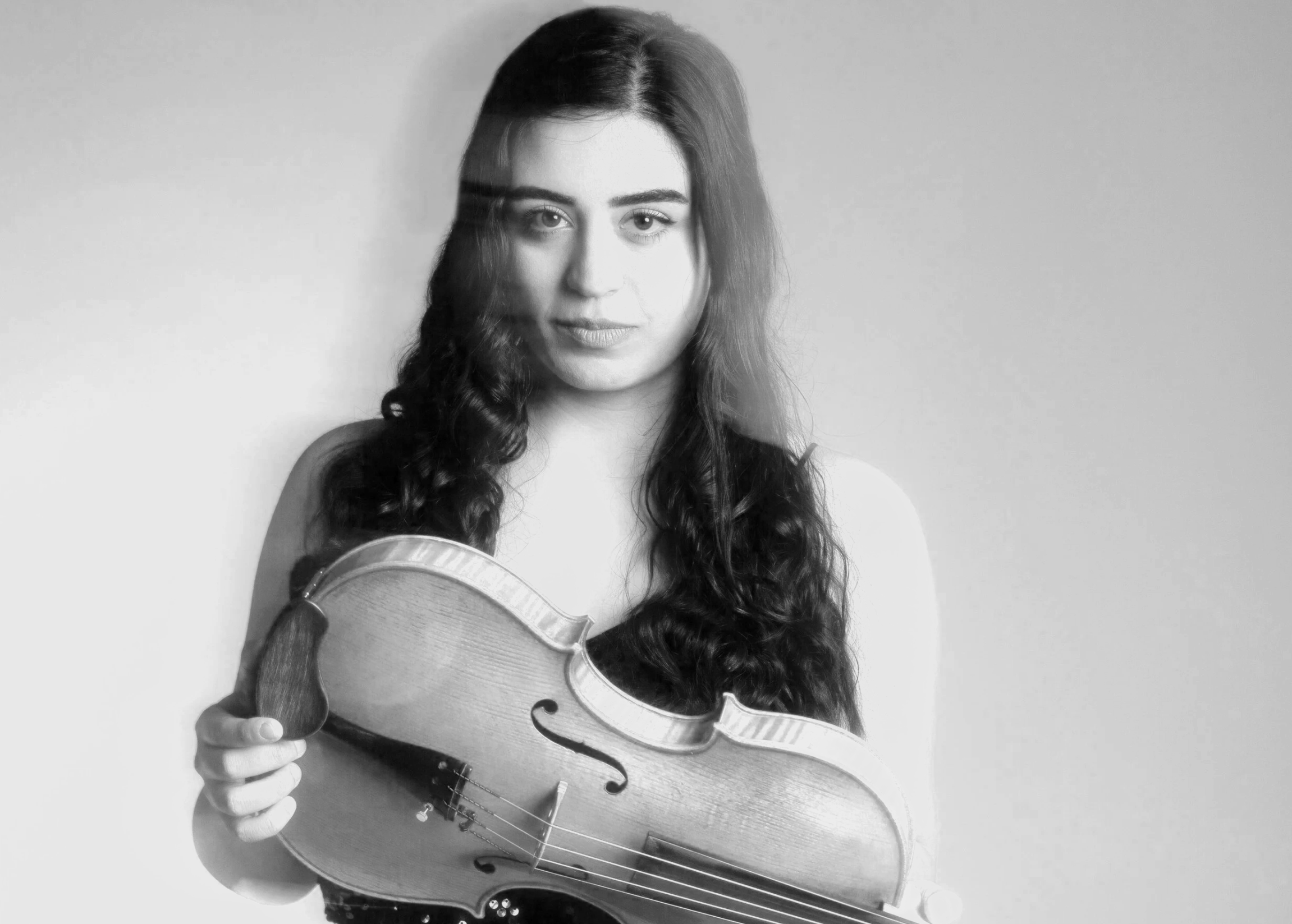 Dr. Kimia Hesabi is an Iranian violist, educator, and arts administrator based in the Washington, D.C. area. Her artistic work focuses particularly on contemporary viola repertoire by composers of the Iranian diaspora. In 2022, she released her debut