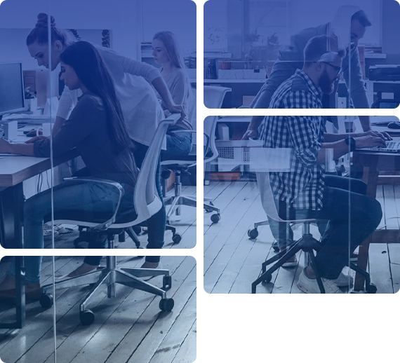 Group of people working together in a modern office with glass walls and wooden floors.