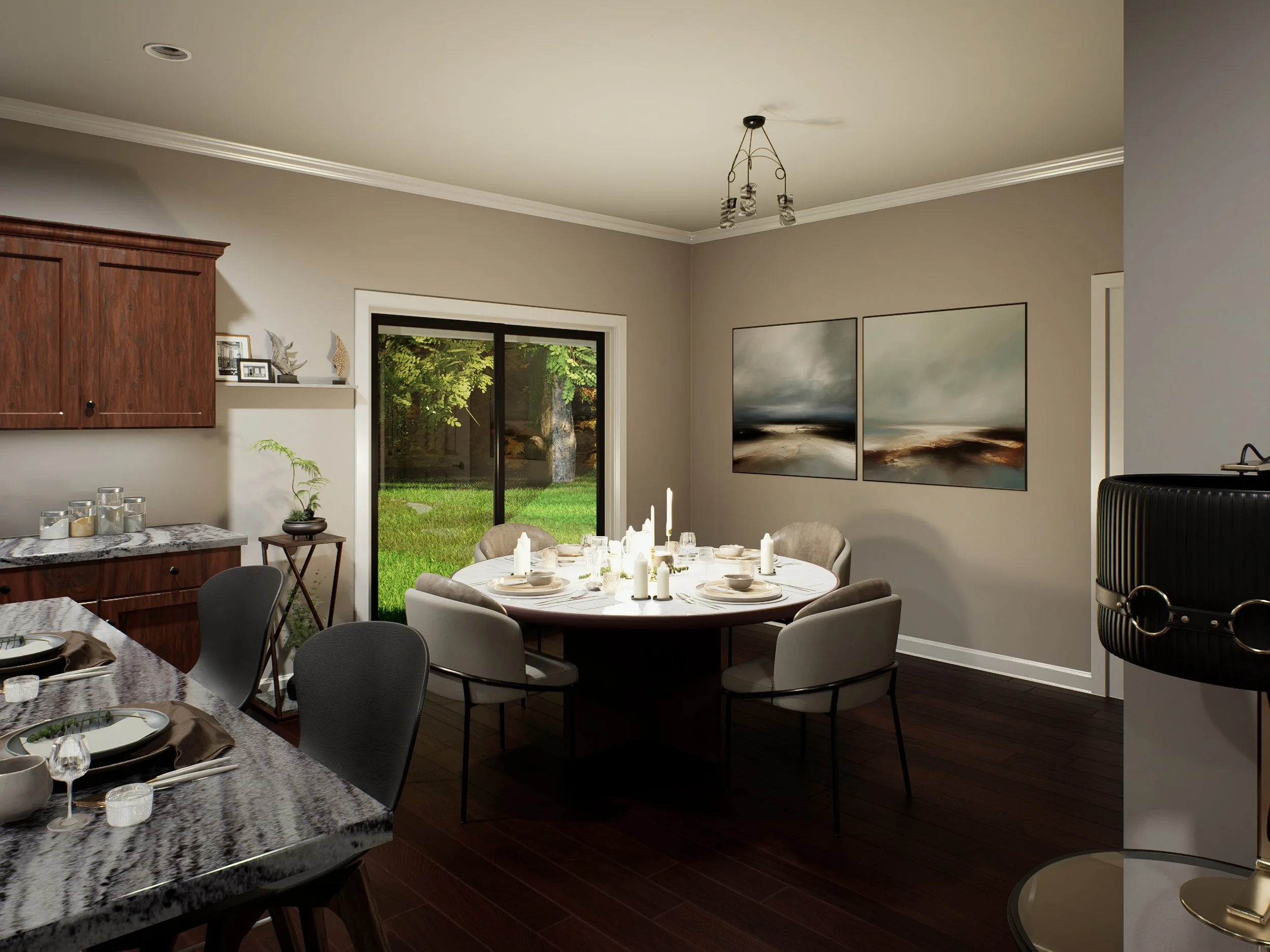 A dining room with a round table set with white plates, glasses, and candles, surrounded by beige upholstered chairs. Large abstract landscape paintings hang on the gray wall. A sliding glass door shows a green backyard with trees.