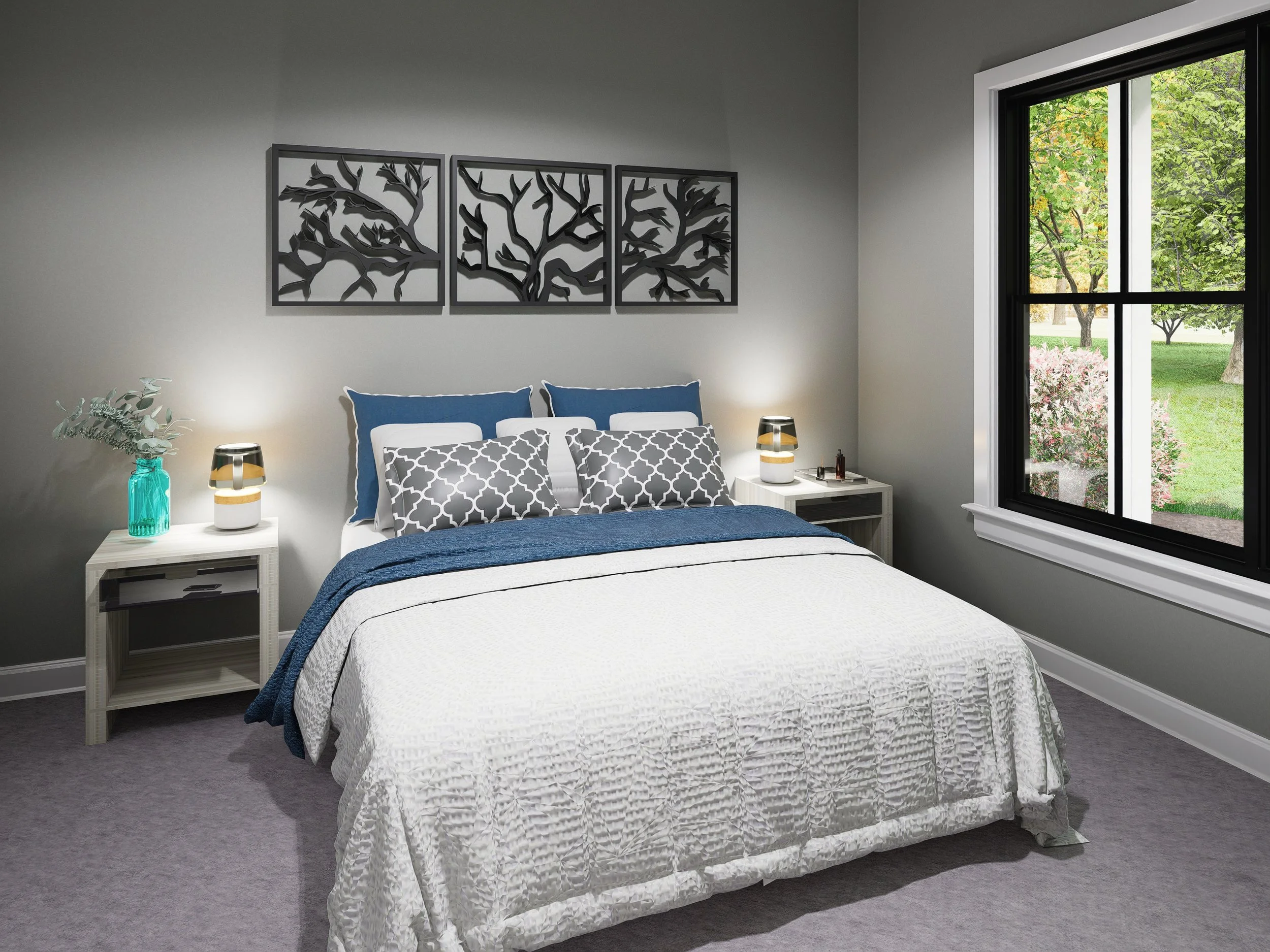 Cozy bedroom with white textured bedspread, blue and gray pillows, matching gray and white patterned bedding, two nightstands with lamps, a framed black metal tree art piece on the gray wall, a large window showing green trees and grass outside.