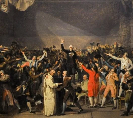 A historical painting of a large crowd of people in a theater or auditorium, with a man standing in the center on a stage, addressing or acknowledging the audience.