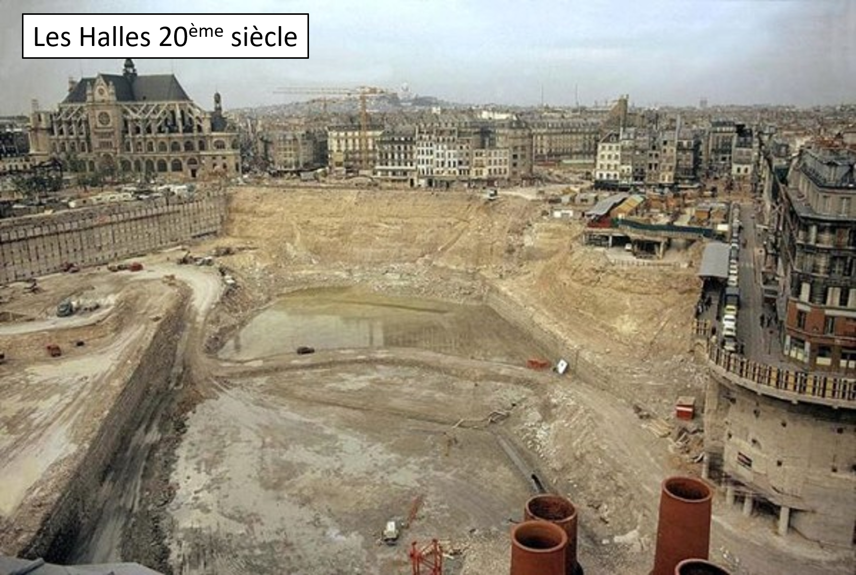 Construction site for Les Halles 20th-century development in Paris, featuring excavated earth, construction machinery, and surrounding buildings.