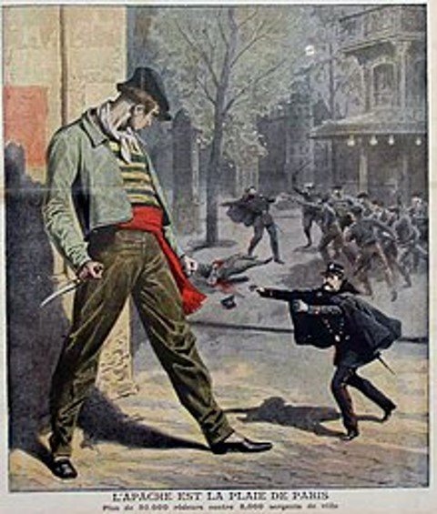 A street scene in Paris showing a young boy pointing a gun at a man with a knife, with a backdrop of a chaotic protest or riot.
