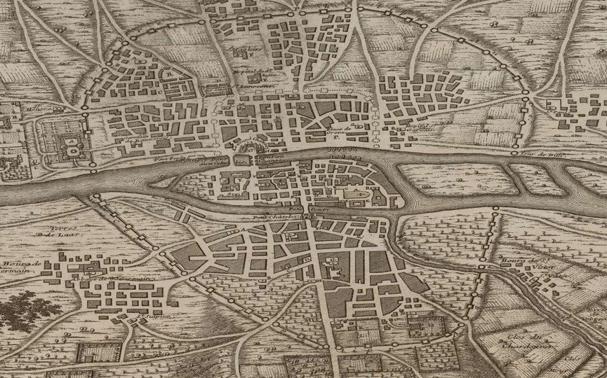 A historic, detailed map of a city with roads, buildings, and green areas, possibly from a European city.