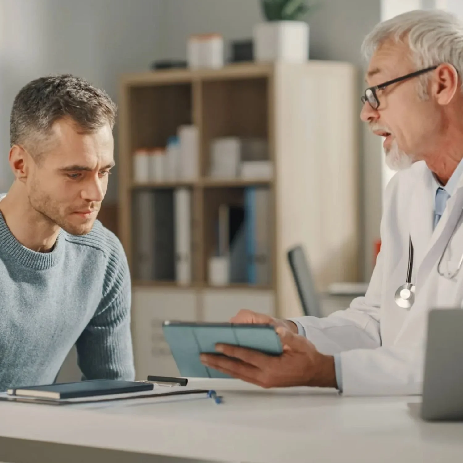 LGBTQ+ Patient Speaking with a Doctor.jpg