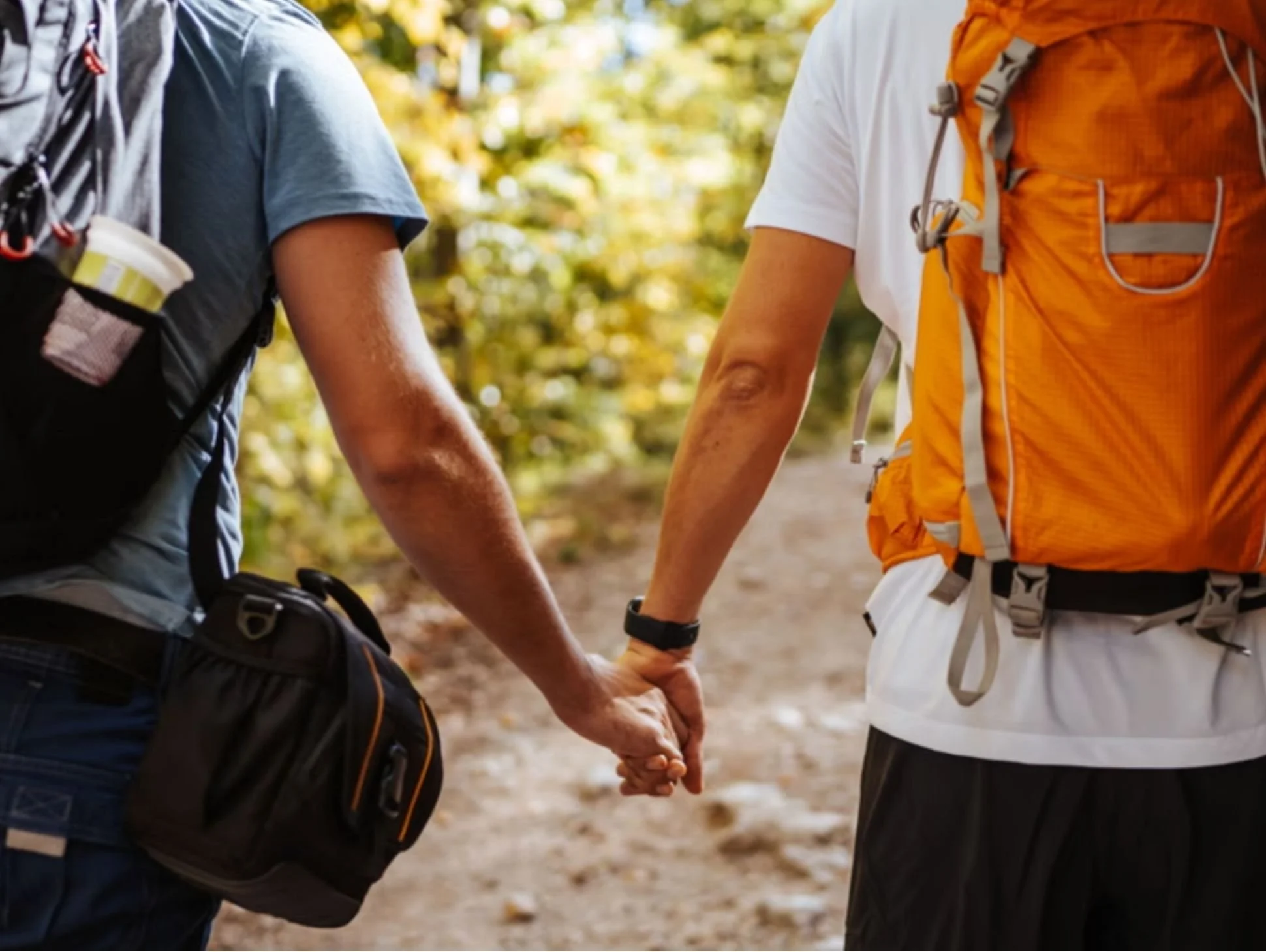 Two Hikers Holding Hands on a Trail.jpg