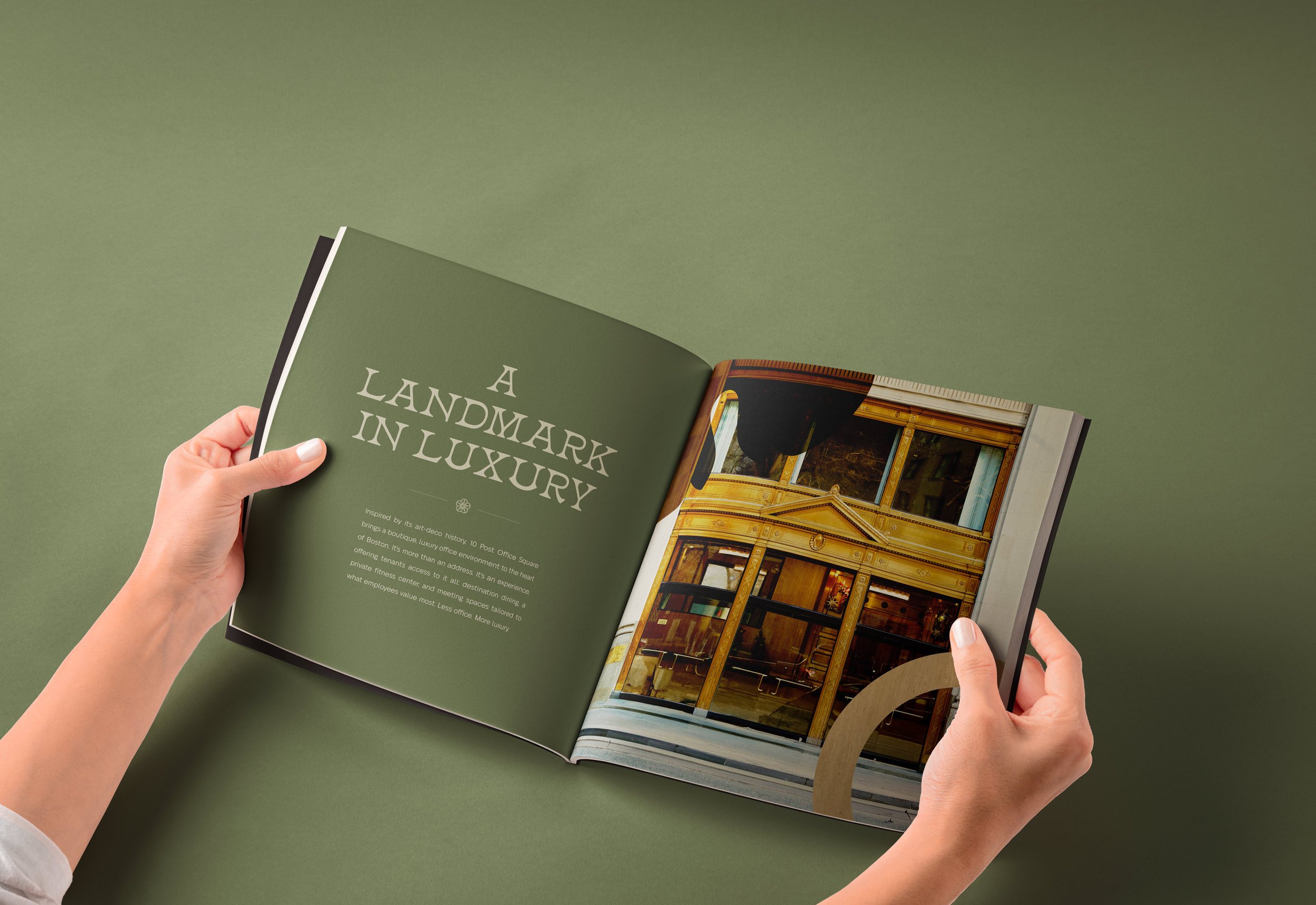 Hands-Holding-Large-Square-Open-Catalog-Book-Free-psd-Mockup.jpg
