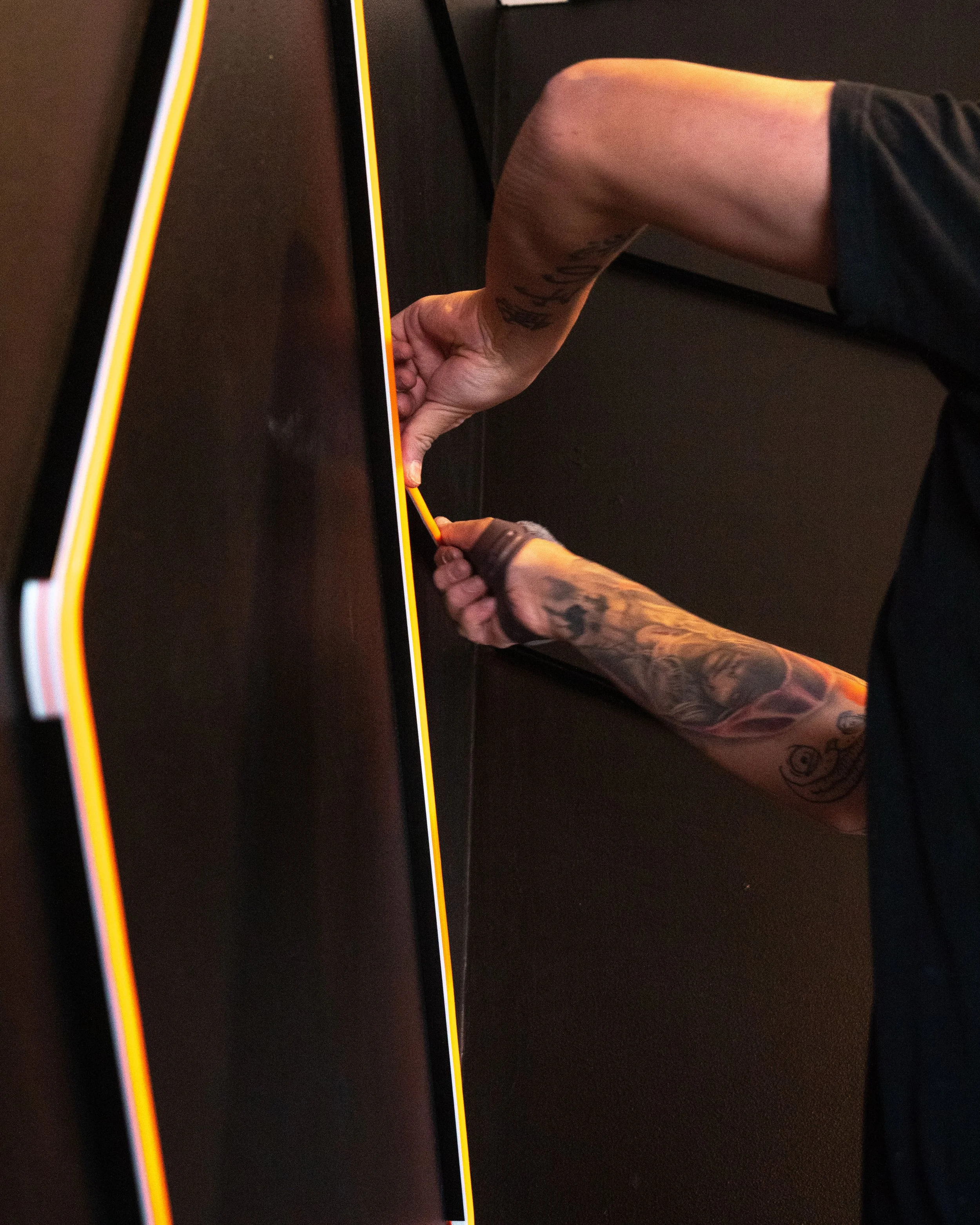 Person assembling a foosball table.