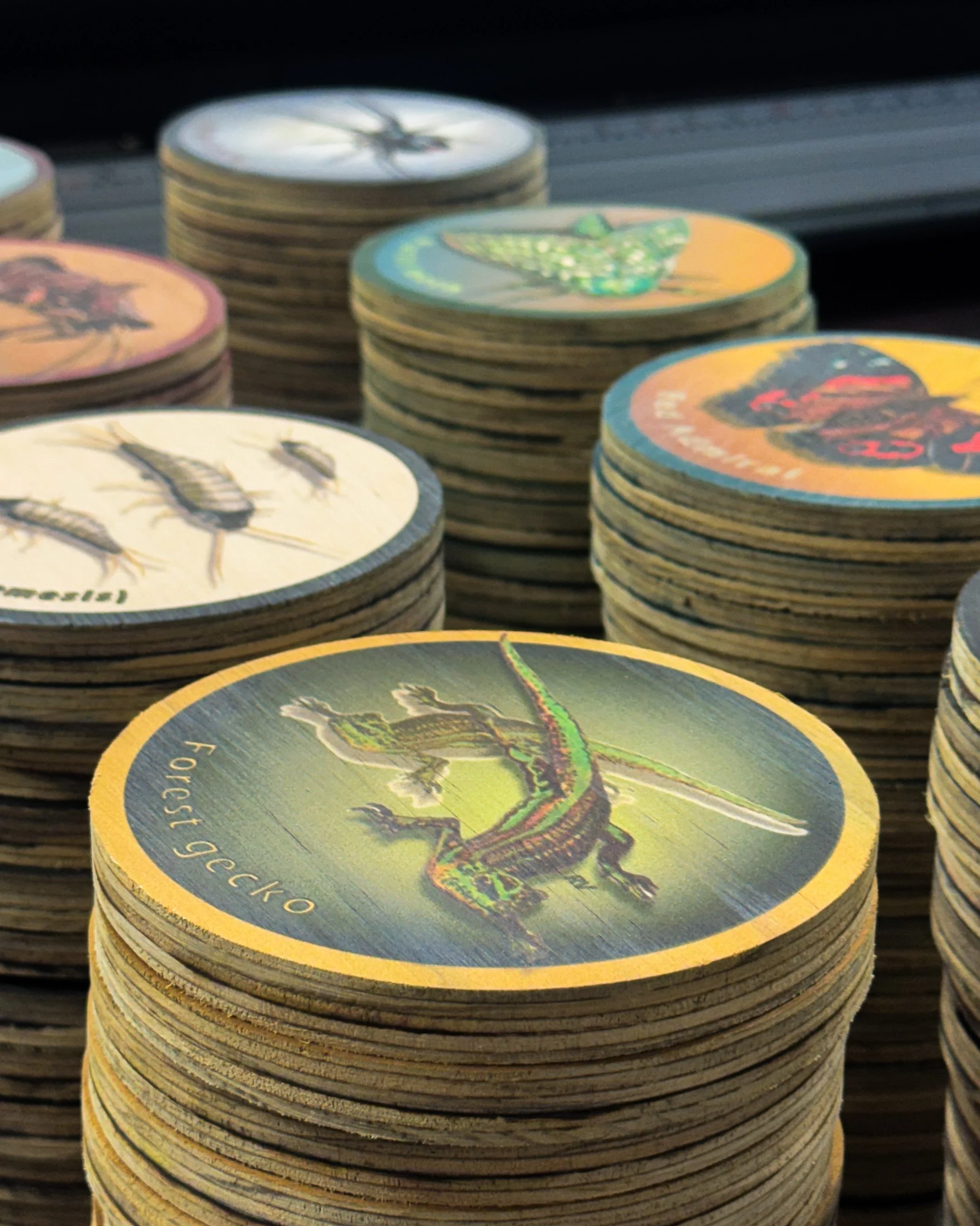 Labour of Love.

These custom printed plywood circles came out looking awesome.

We router cut the timber and then spent a fair few hours sanding the edges and faces prepping them for printing. 

We made a template jig that housed 30 of these at a ti