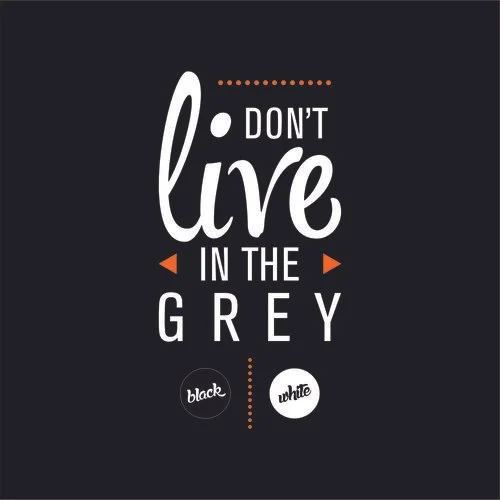Inspirational quote: 'Don't live in the grey' with black and white color scheme and decorative orange accents.
