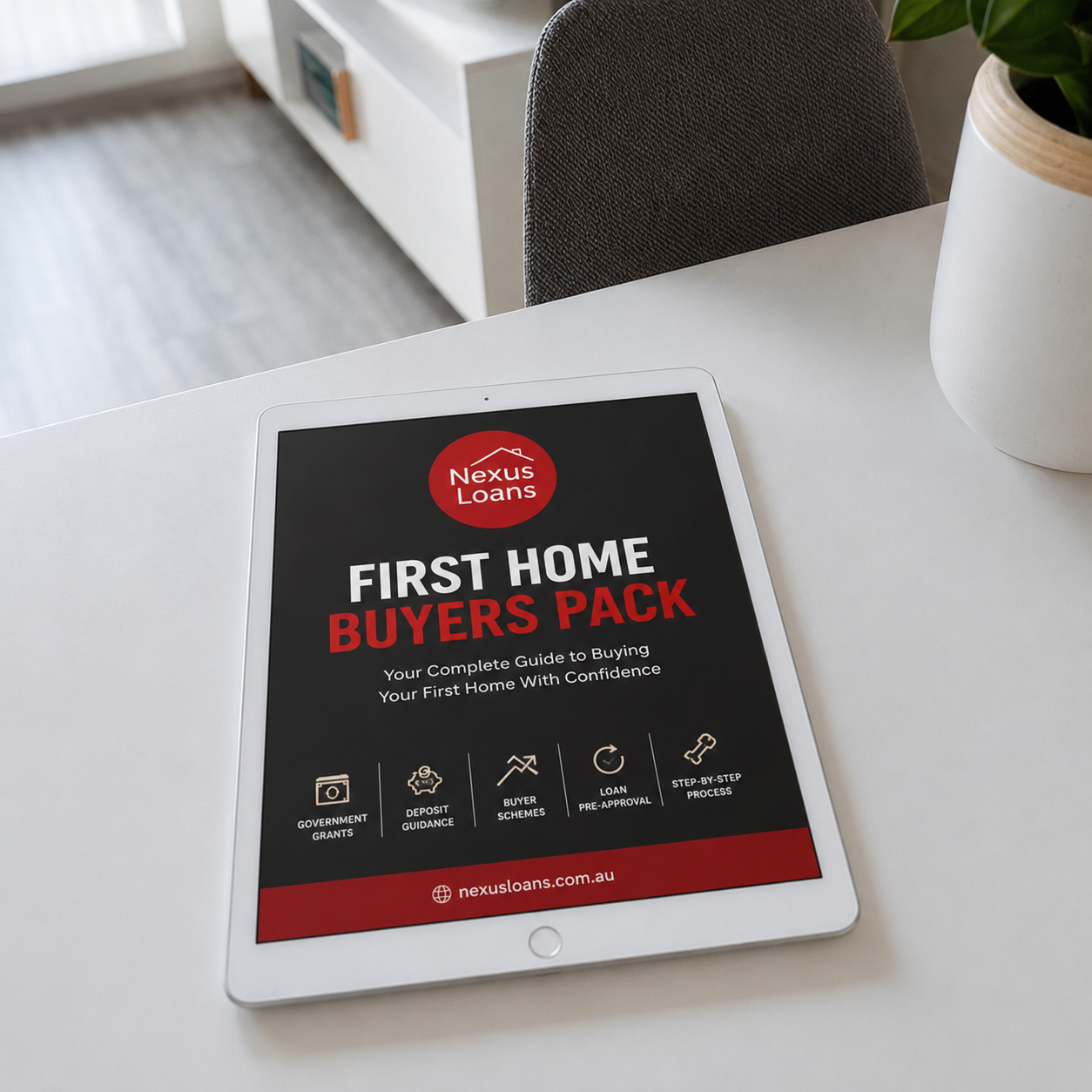 A tablet displaying a digital brochure for Nexus Loans titled 'First Home Buyers Pack' is placed on a white table next to a potted plant with green leaves.