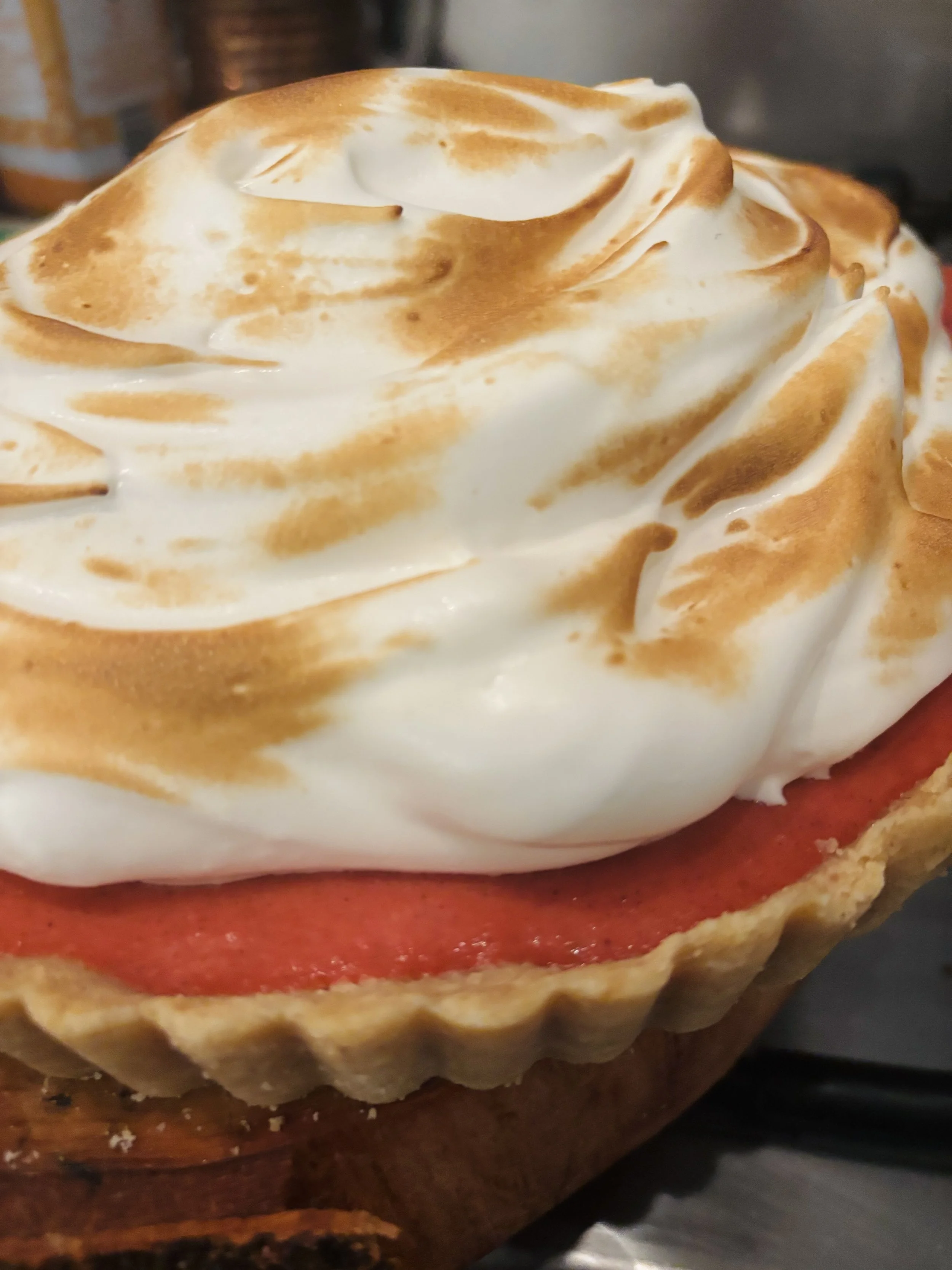 Dragonfruit curd tart topped with meringue
