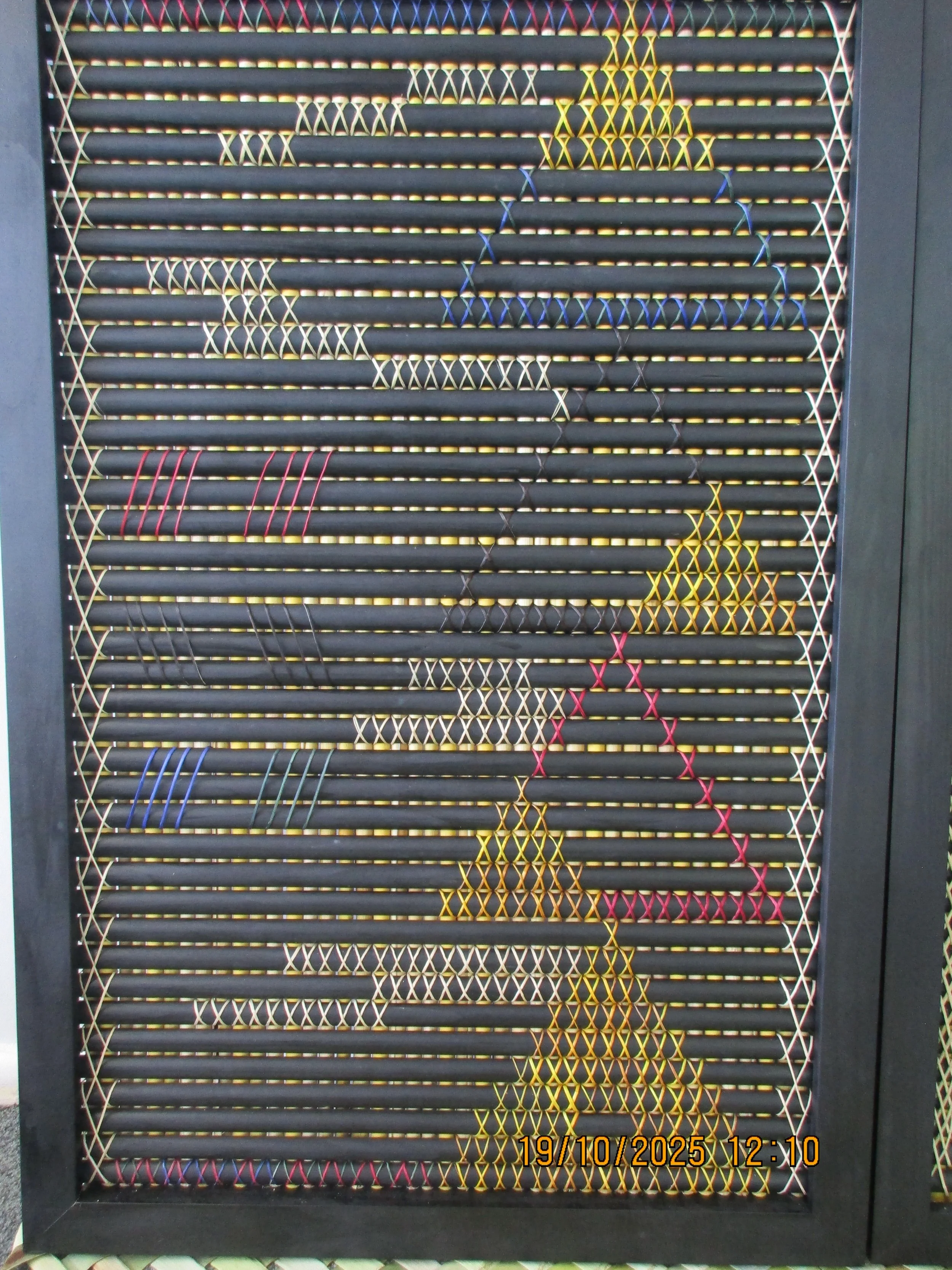 Colorful string art on a black background with geometric patterns and illustrations.