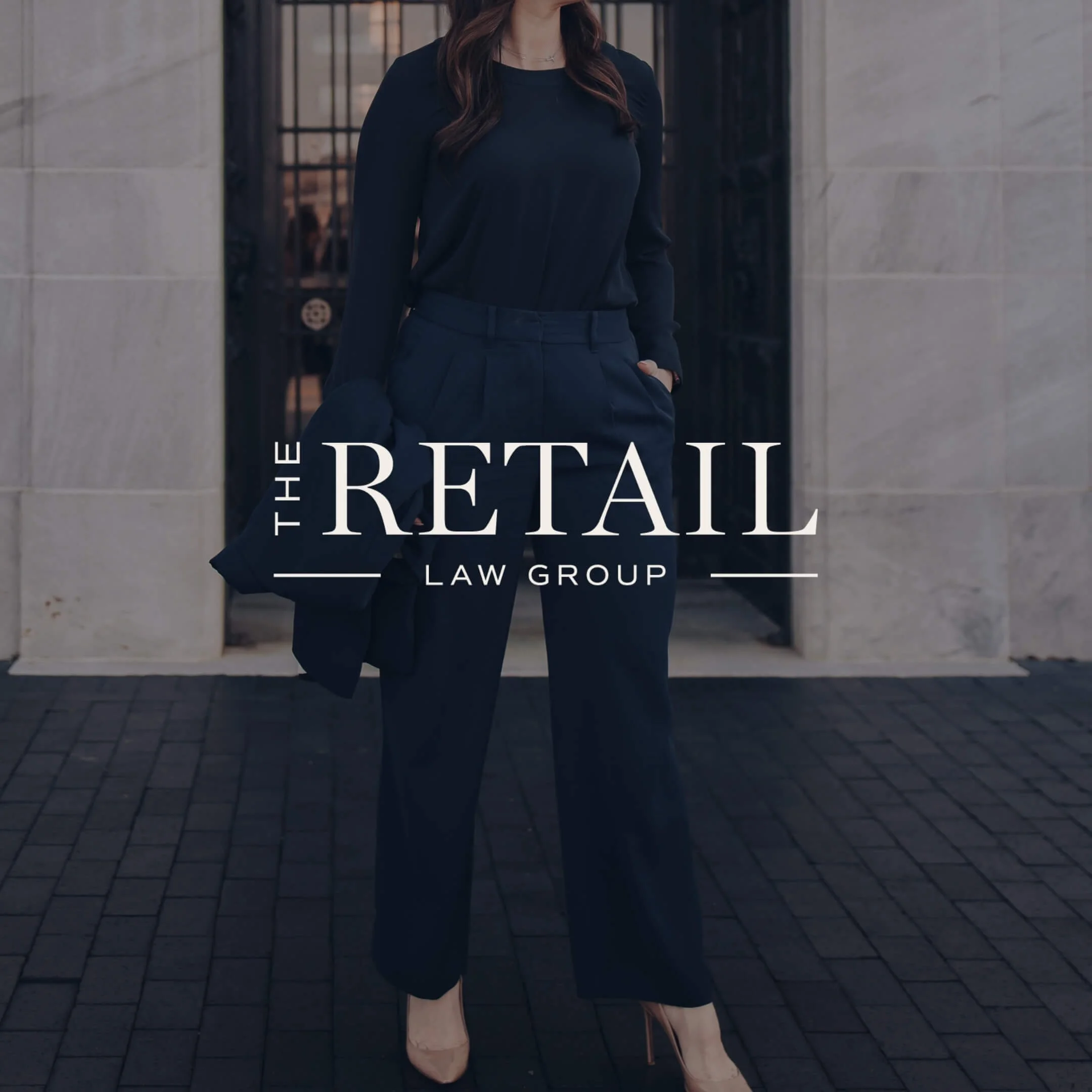 logo design for the retail lawgroup overlayed on a photo of their founder