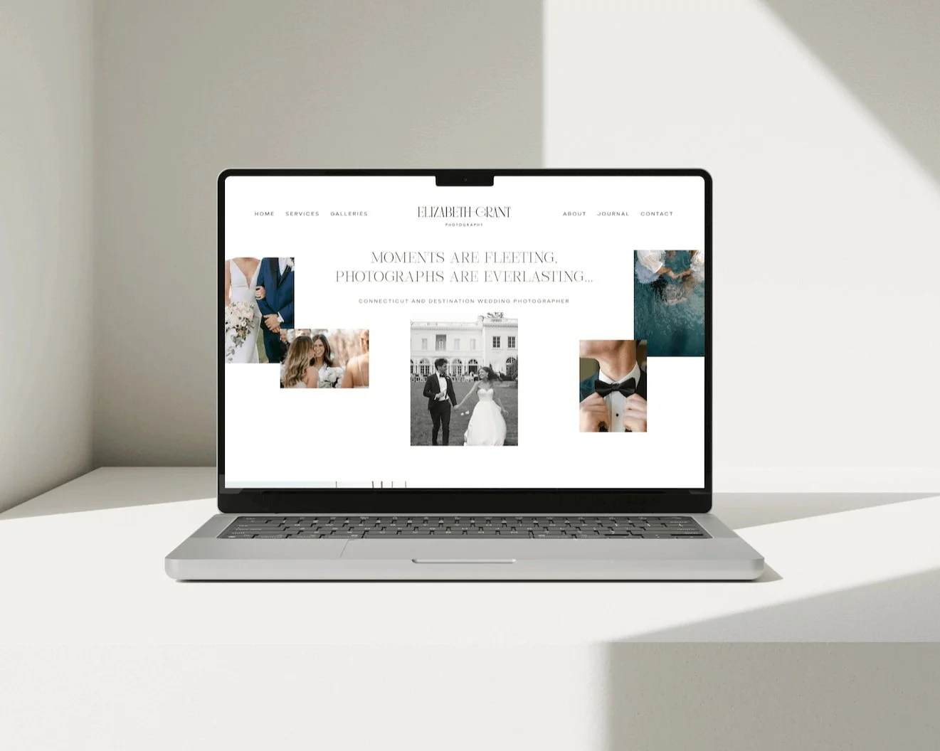device mockup of home page website design for wedding photographer