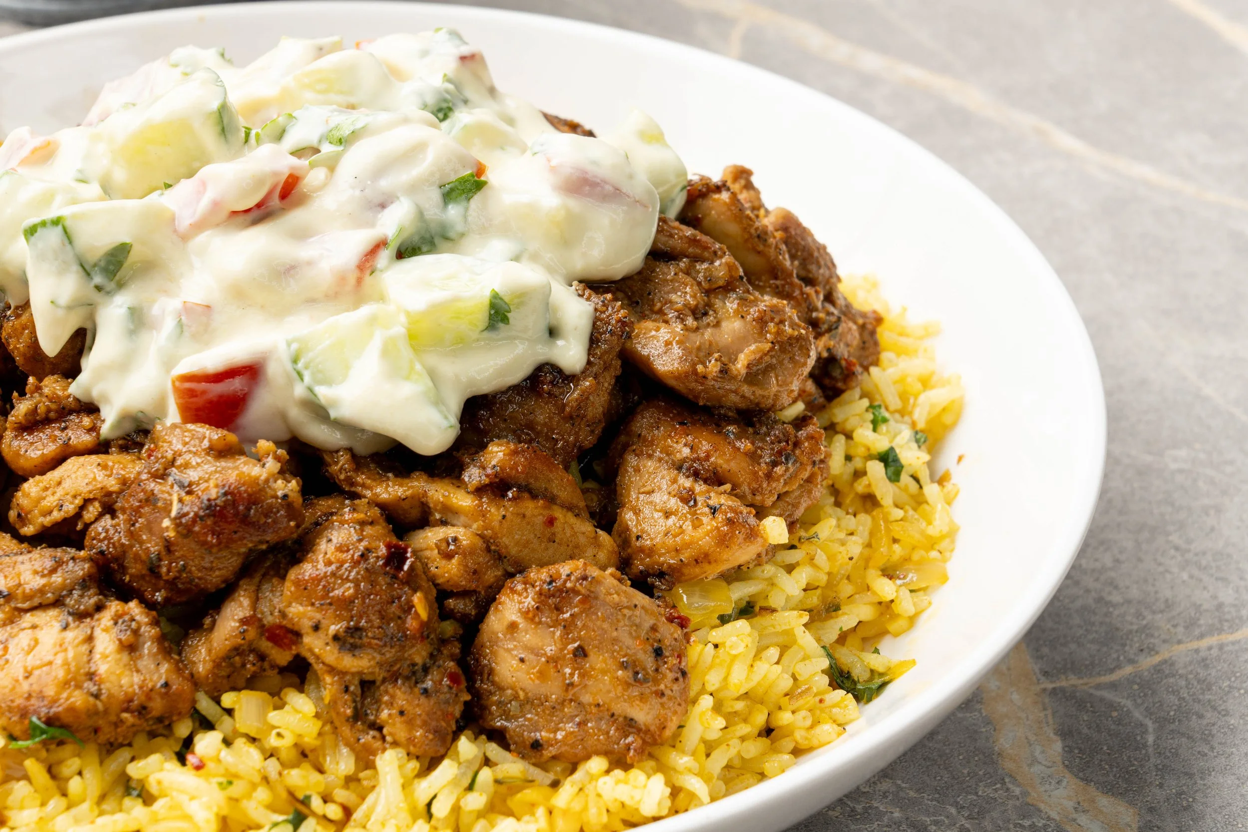 Lemon-Herb Chicken Bowls With Feta, Tzatziki &amp; Herby Rice