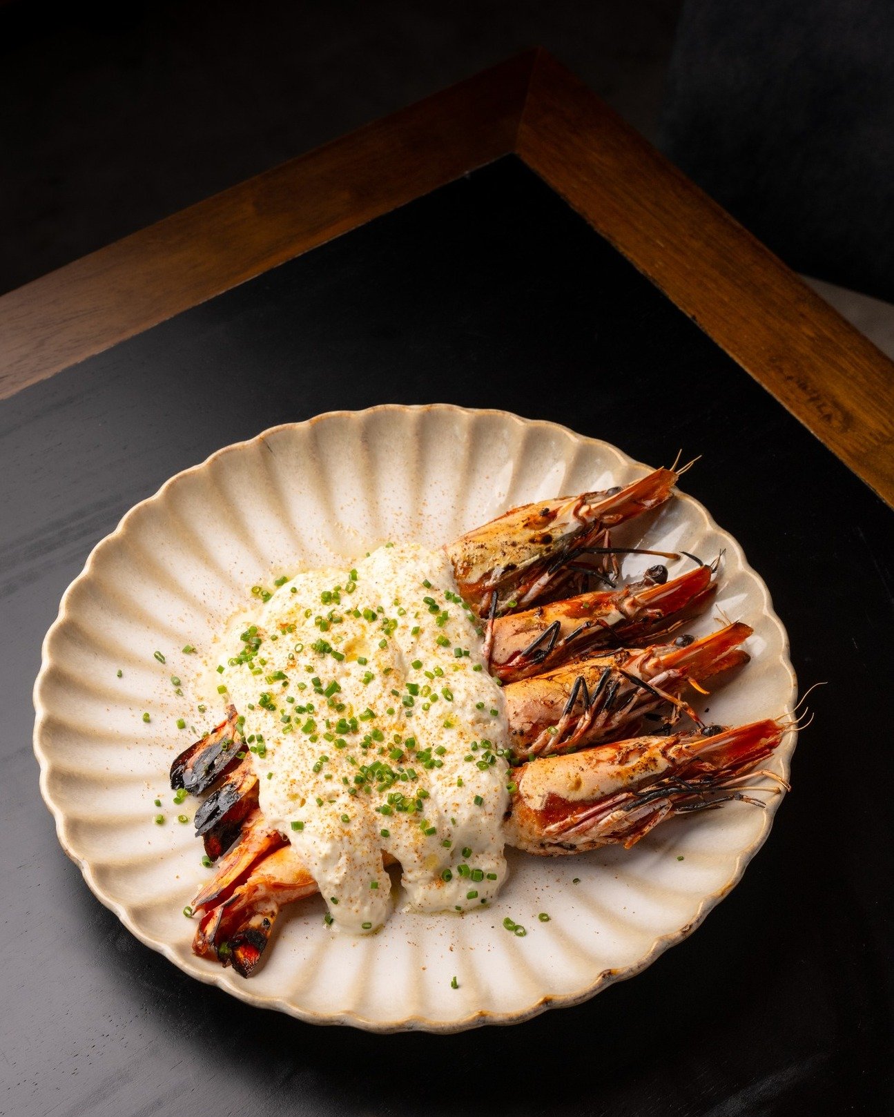 Our big tiger prawns, fire-grilled and finished with cheese espuma, are exactly the kind of plate you order on a Saturday&mdash;rich, smoky, and made for sharing.
Open a bottle of wine and let the night roll on 🔥

กุ้งลายเสือตัวใหญ่ ย่างไฟจนหอม แล้ว