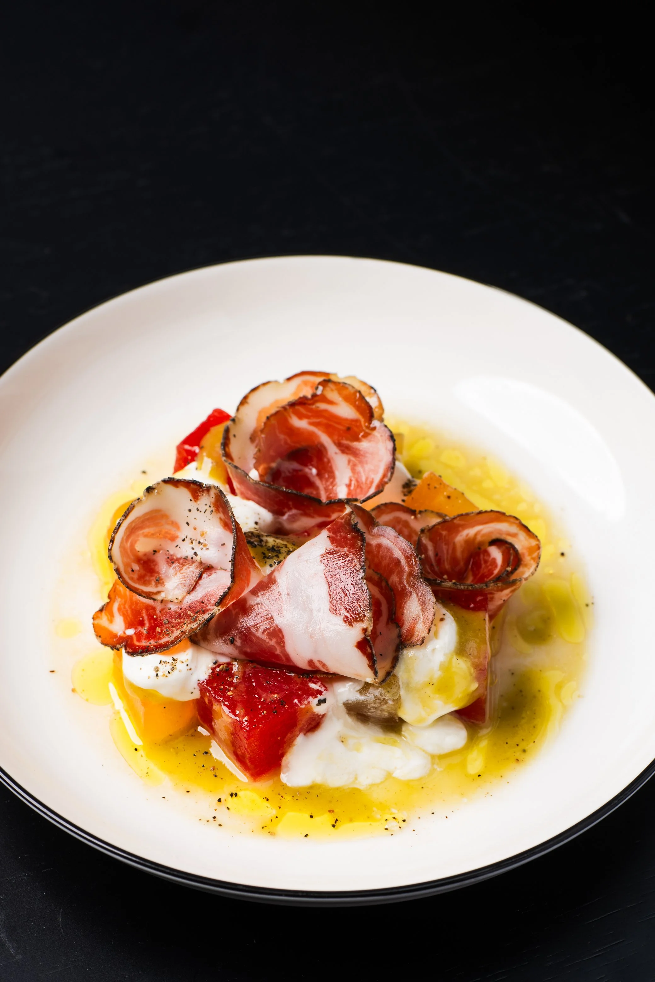 Compressed Melon & Coppa
melon infused with sweet and salty syrup, paired with local fresh stracciatella cheese and thinly sliced coppa