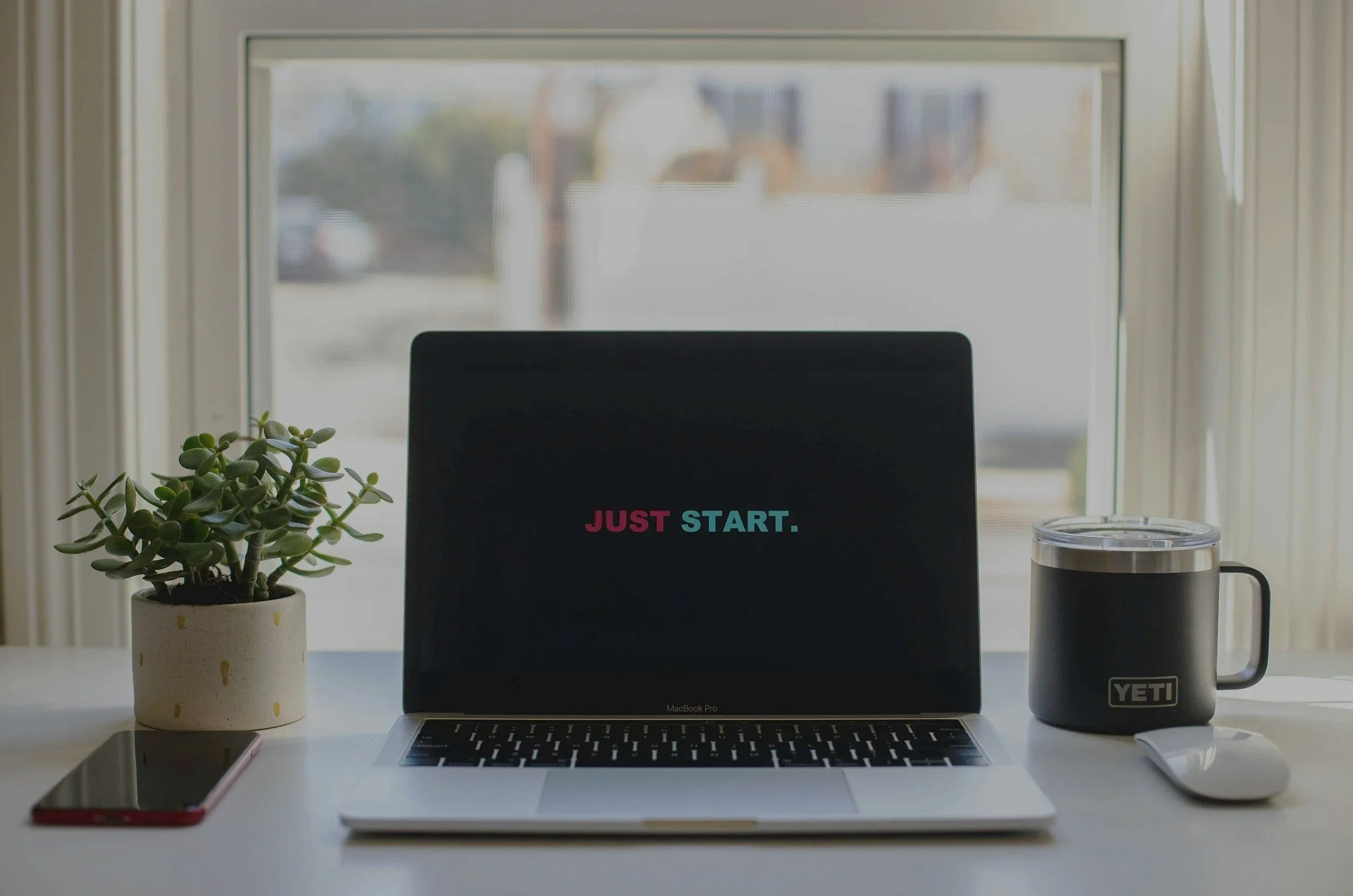 laptop with text Just start